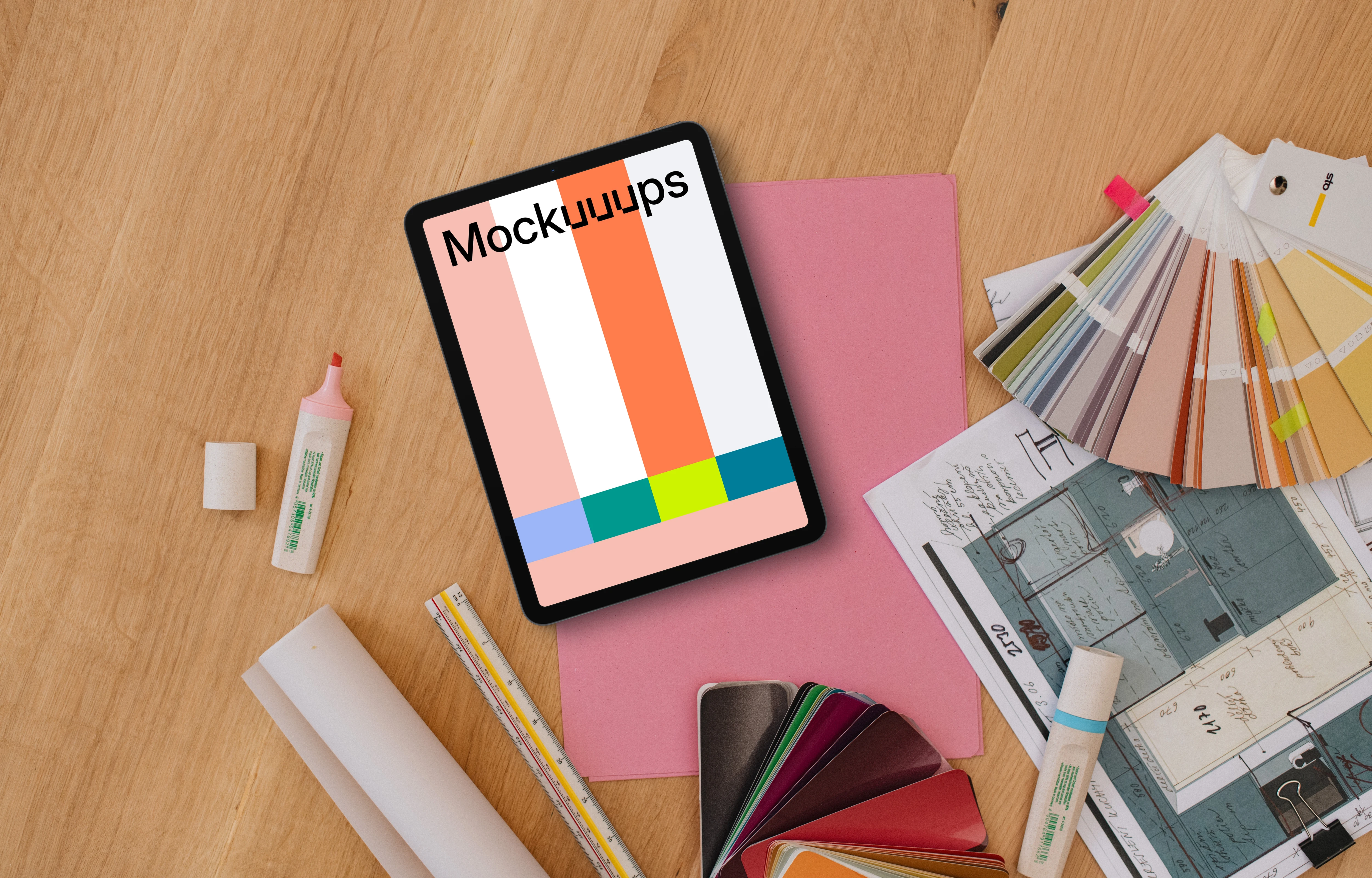 Tablet mockup with architect's design materials