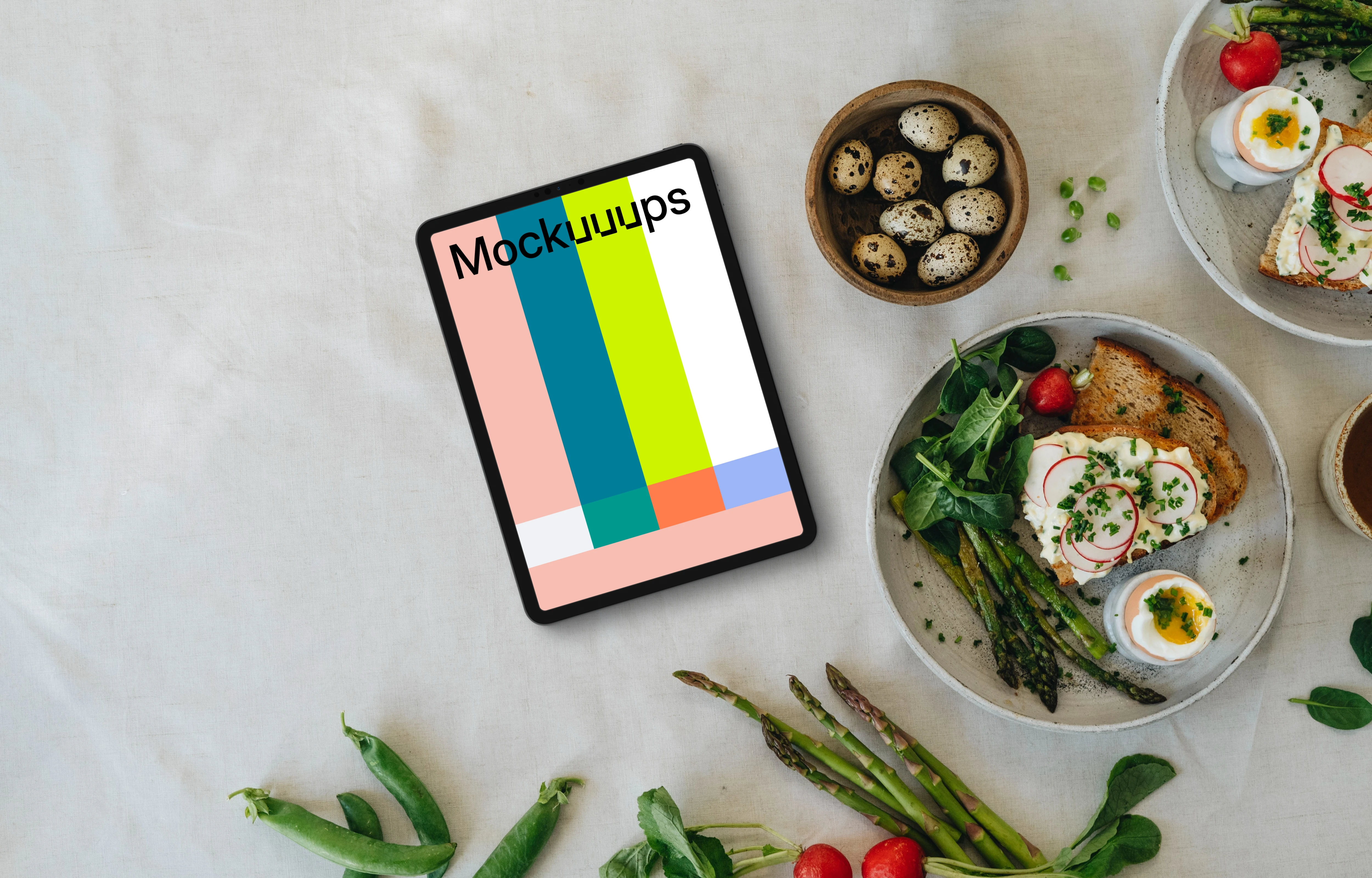 Tablet mockup with Easter snack and spring vegetables