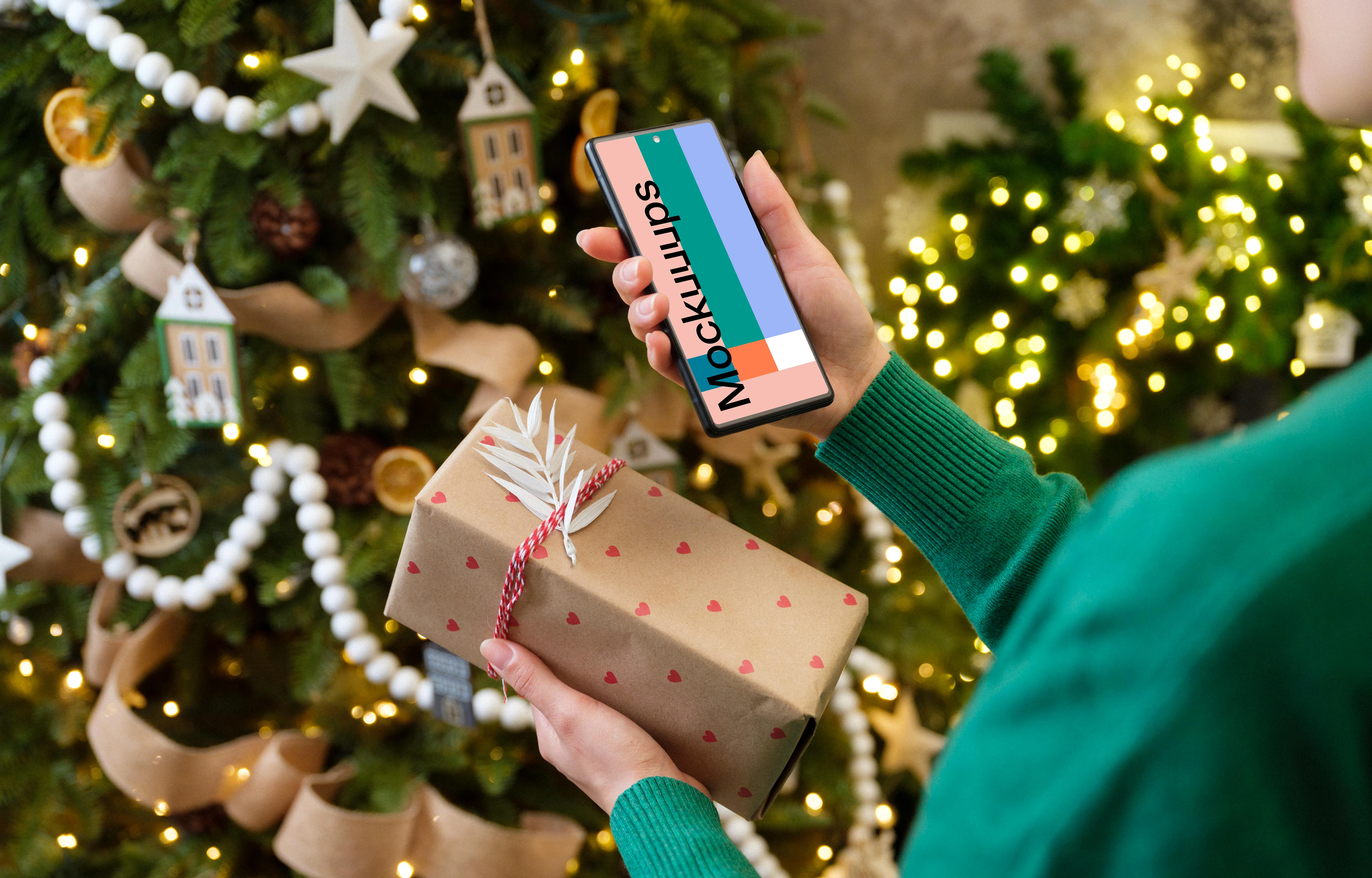 Woman holding a phone and Christmas present