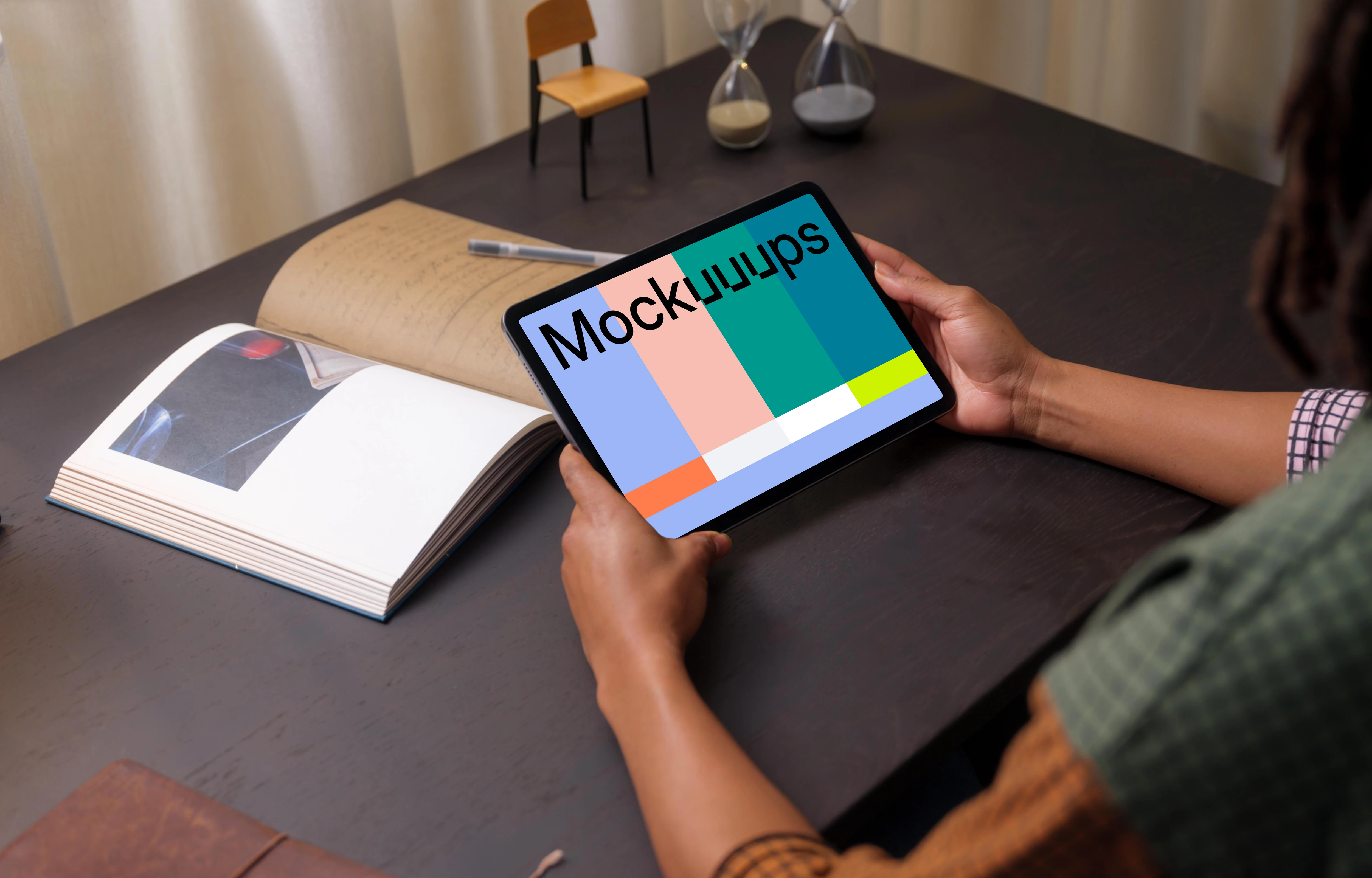 Woman holding an iPad Air mockup