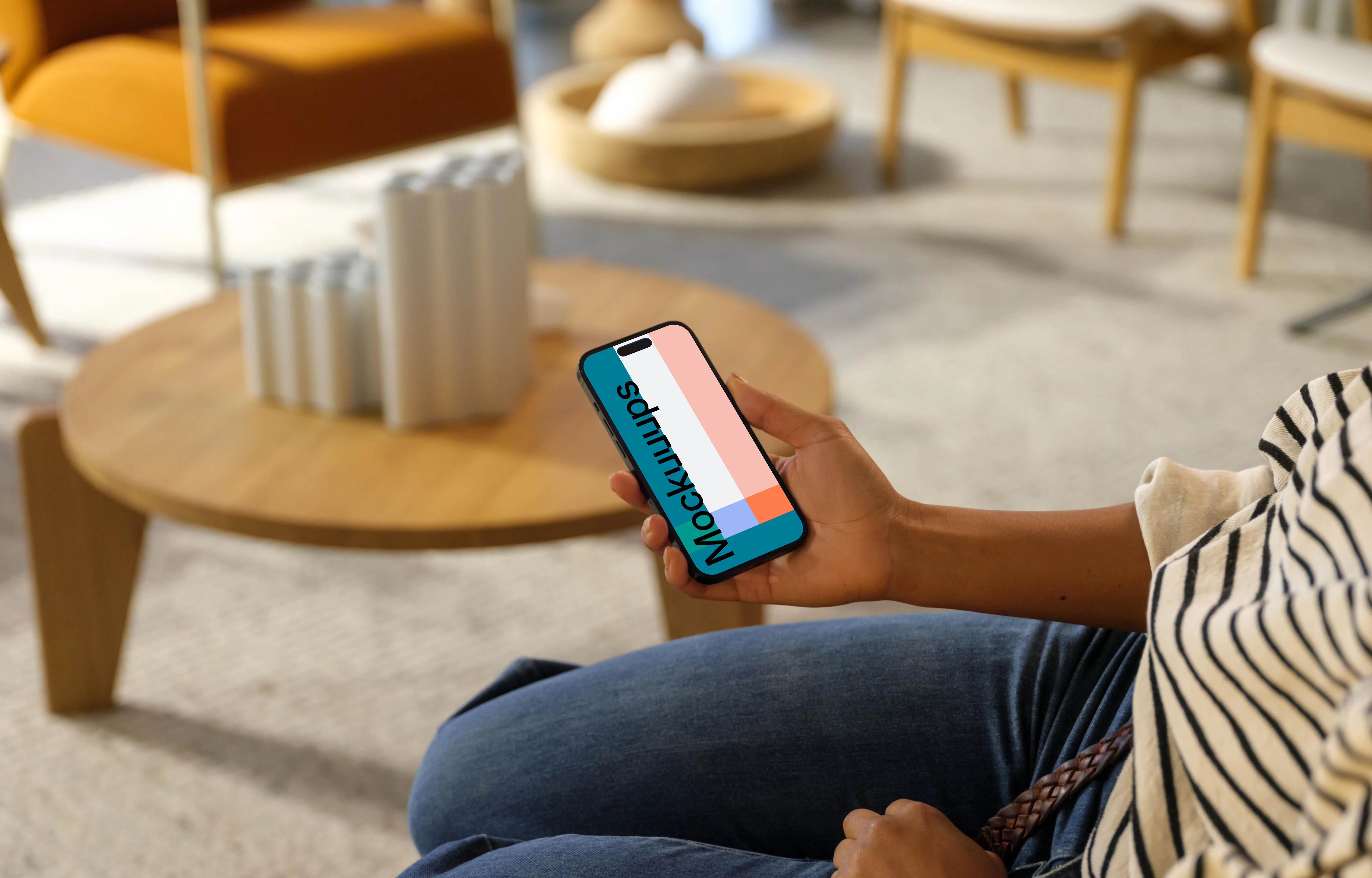 Woman holding an iPhone 14 Pro mockup