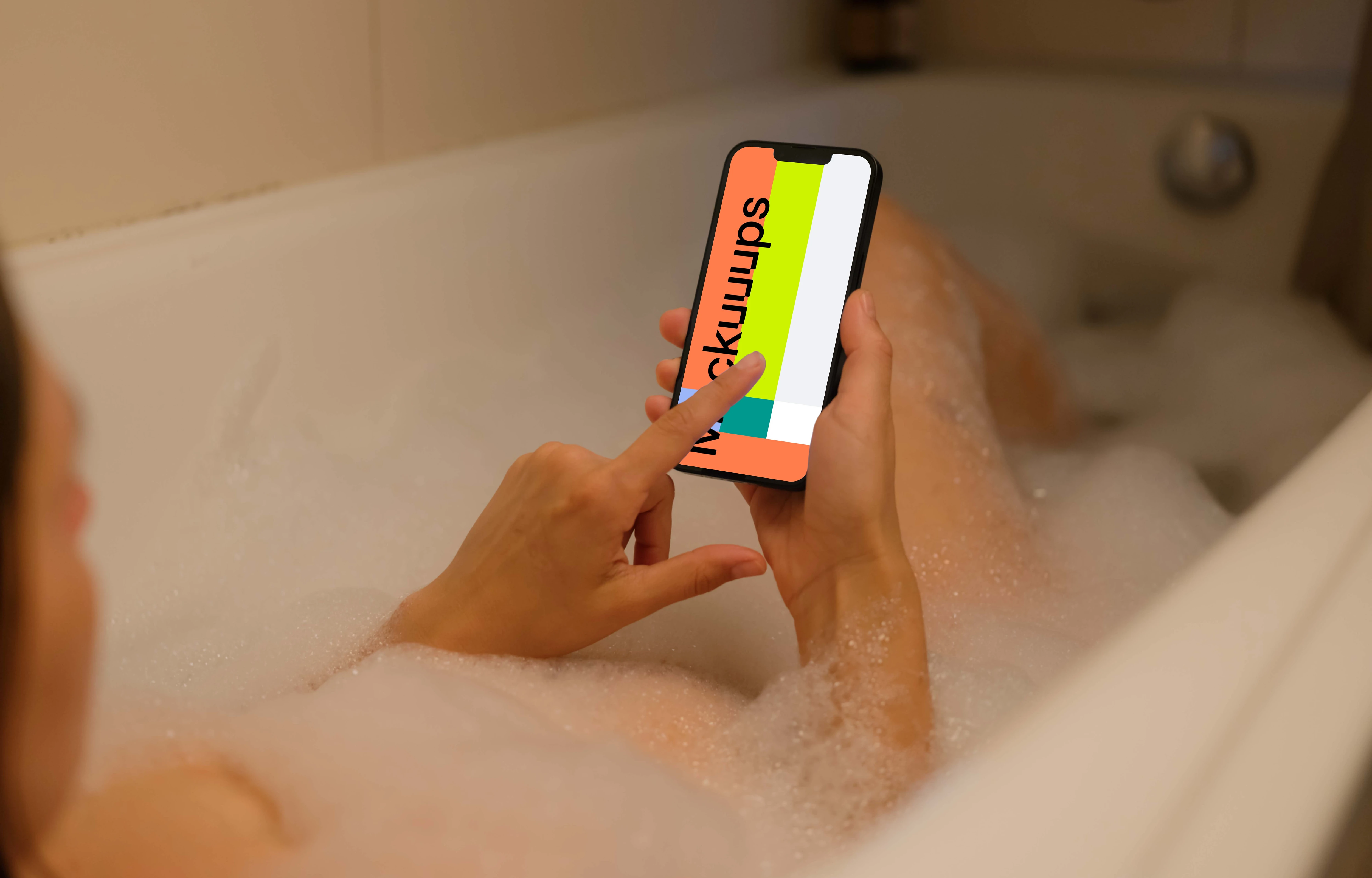 Woman pointing at an iPhone 13 mockup