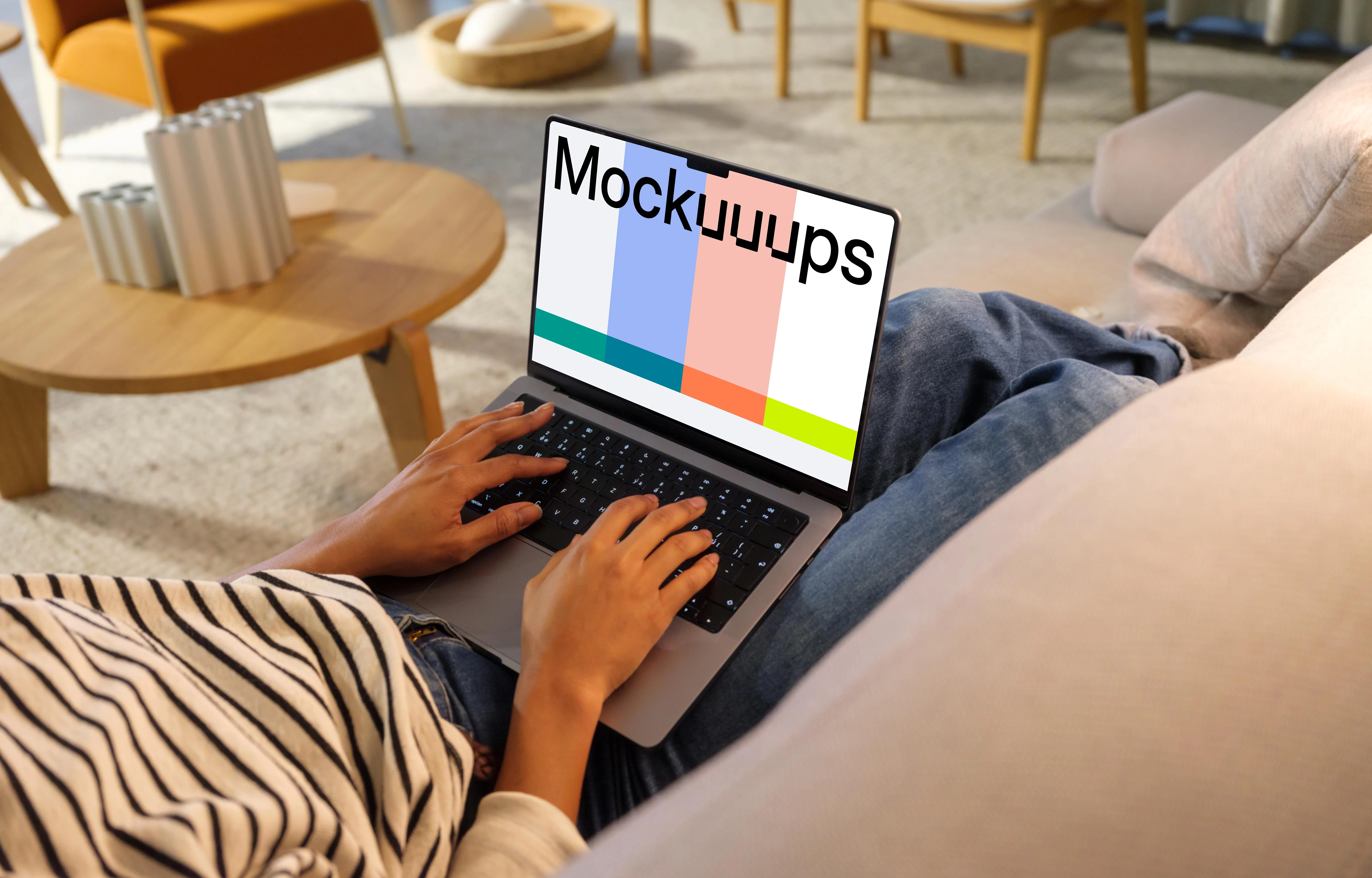 Woman typing on a MacBook Pro 14 mockup