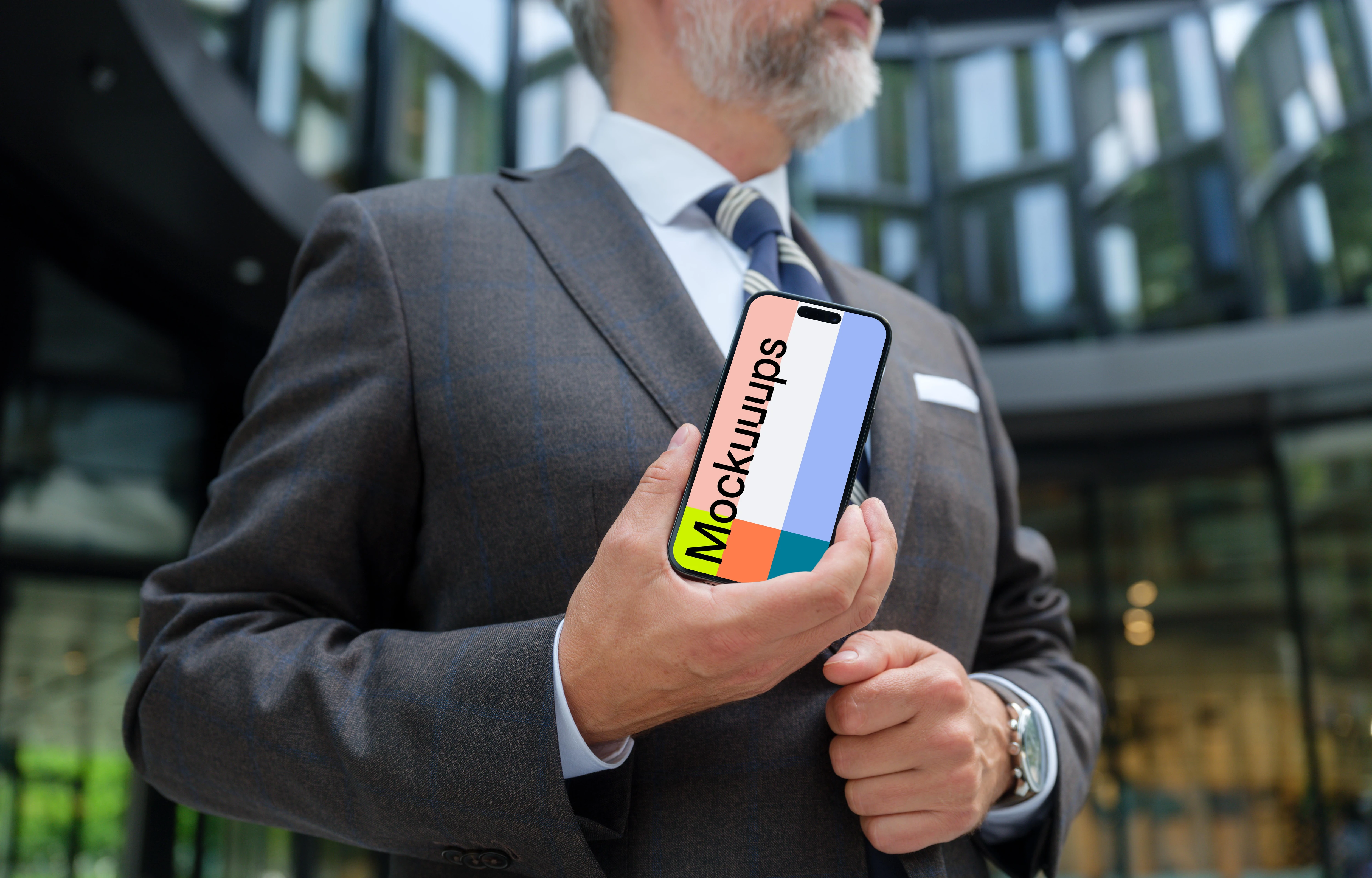 Businessman holding a phone