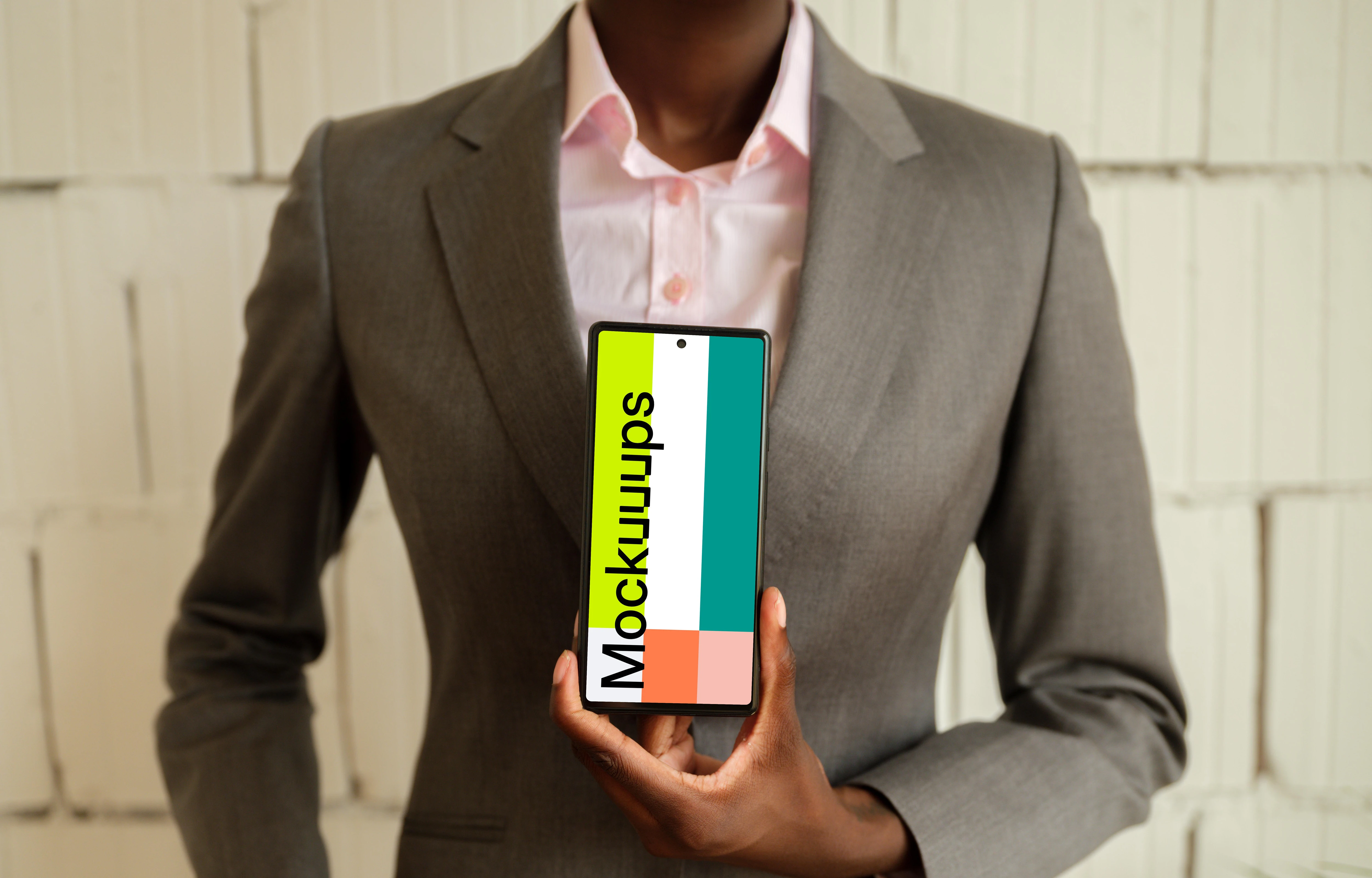 Businesswoman with phone in the office workspace
