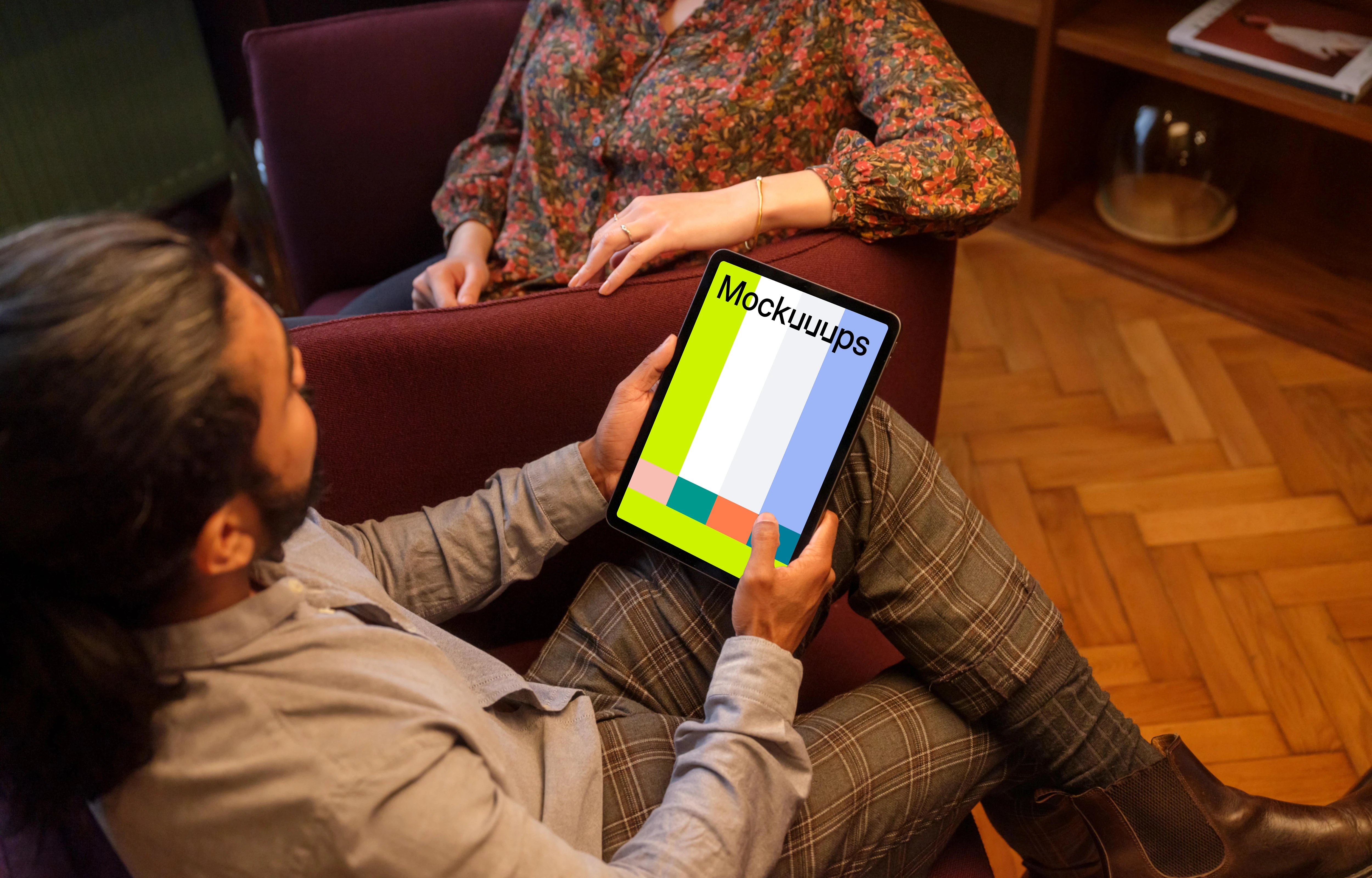 Co-workers in the office with iPad mockup