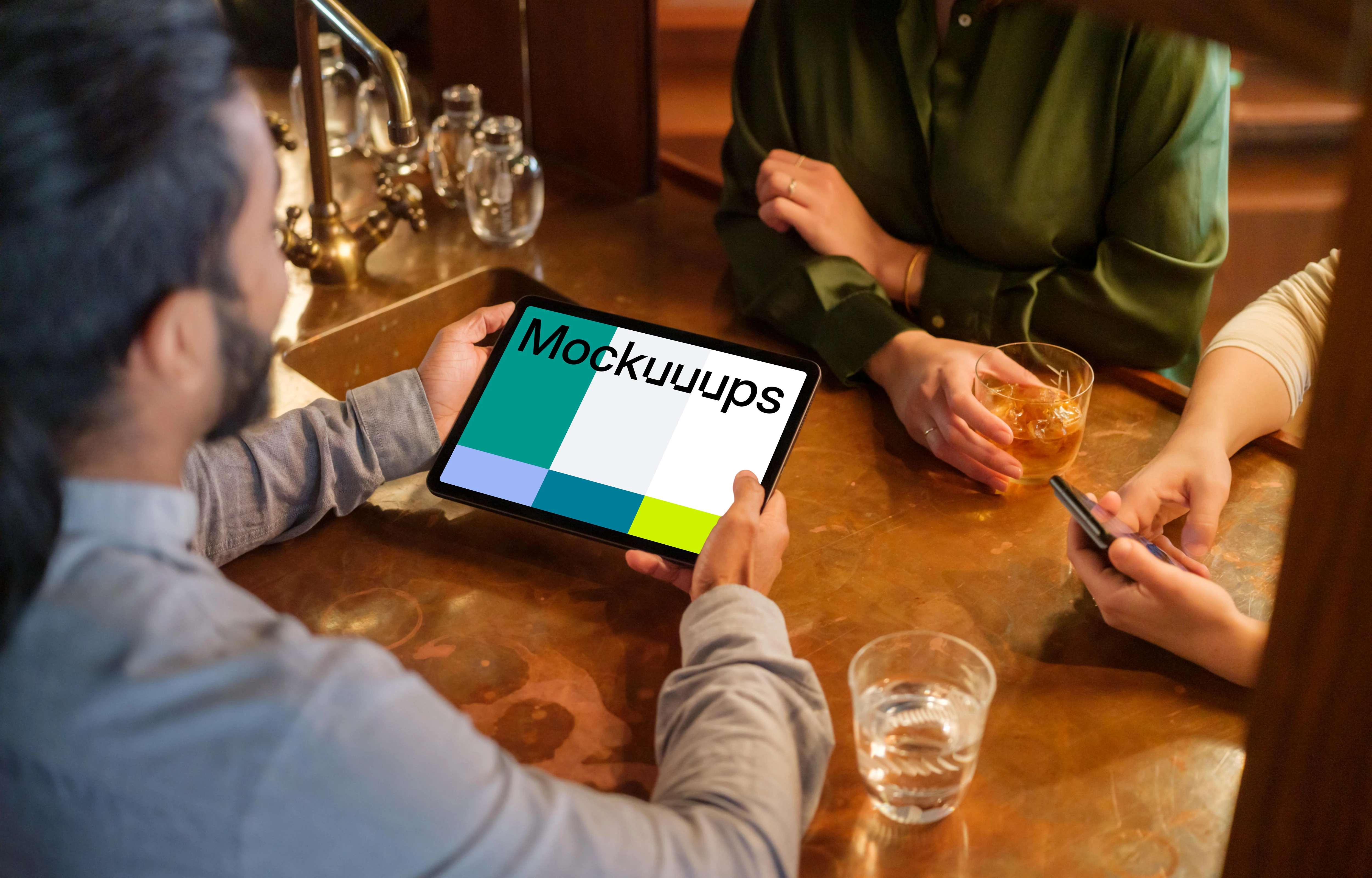 Colleagues in the lounge with iPad mockup