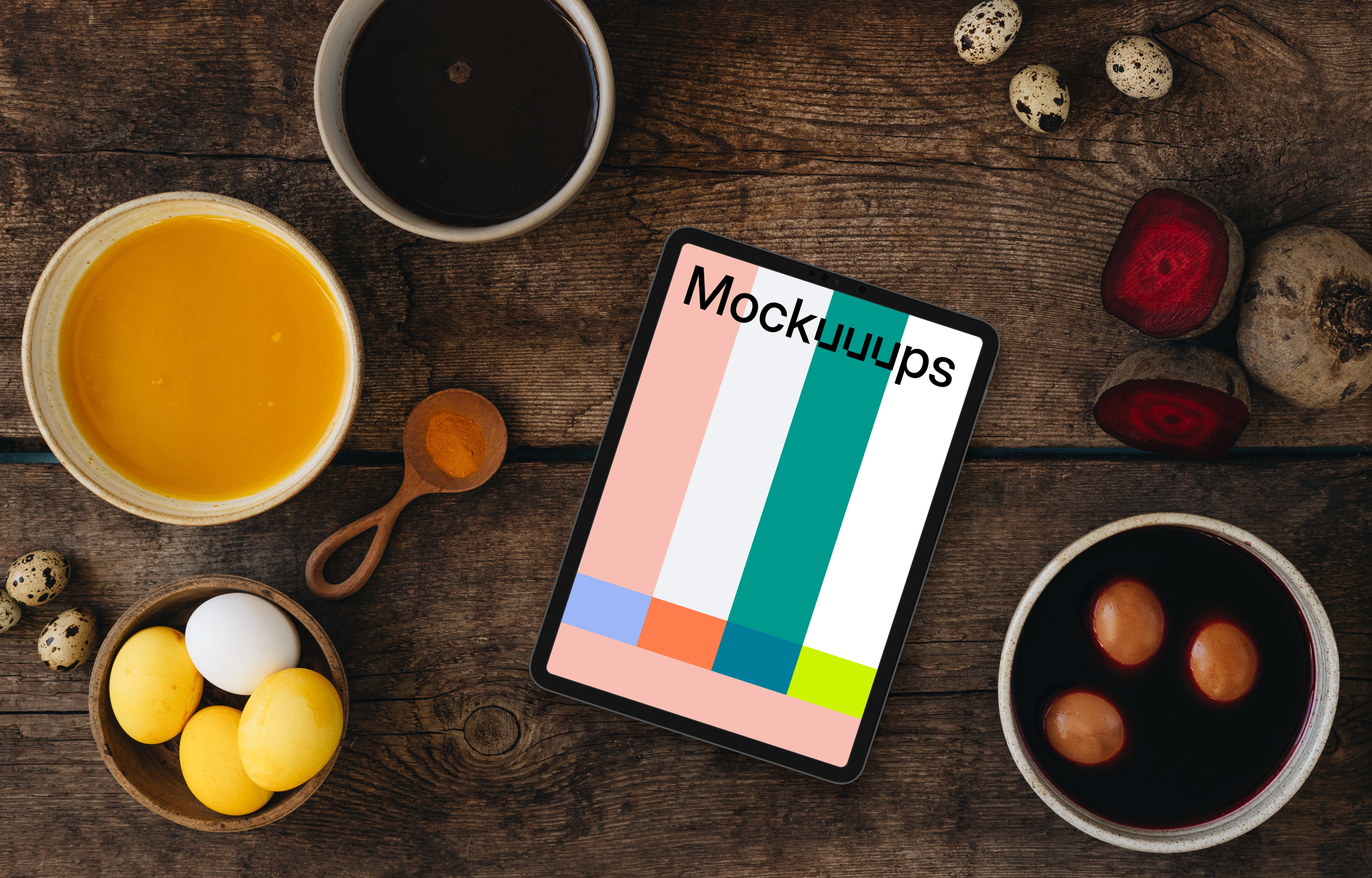 Coloring Easter eggs around tablet mockup