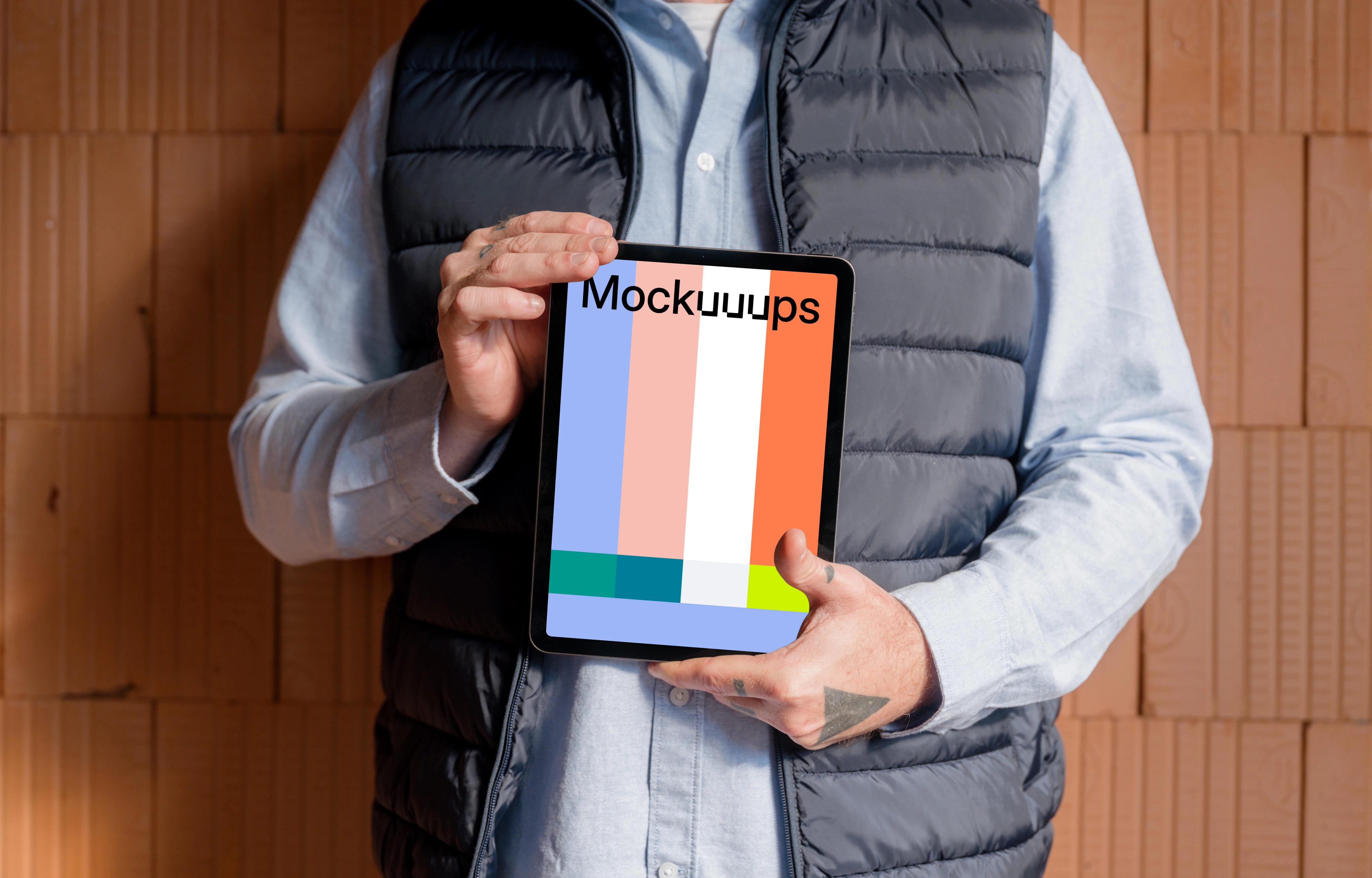 Construction worker confidently holding an iPad mockup
