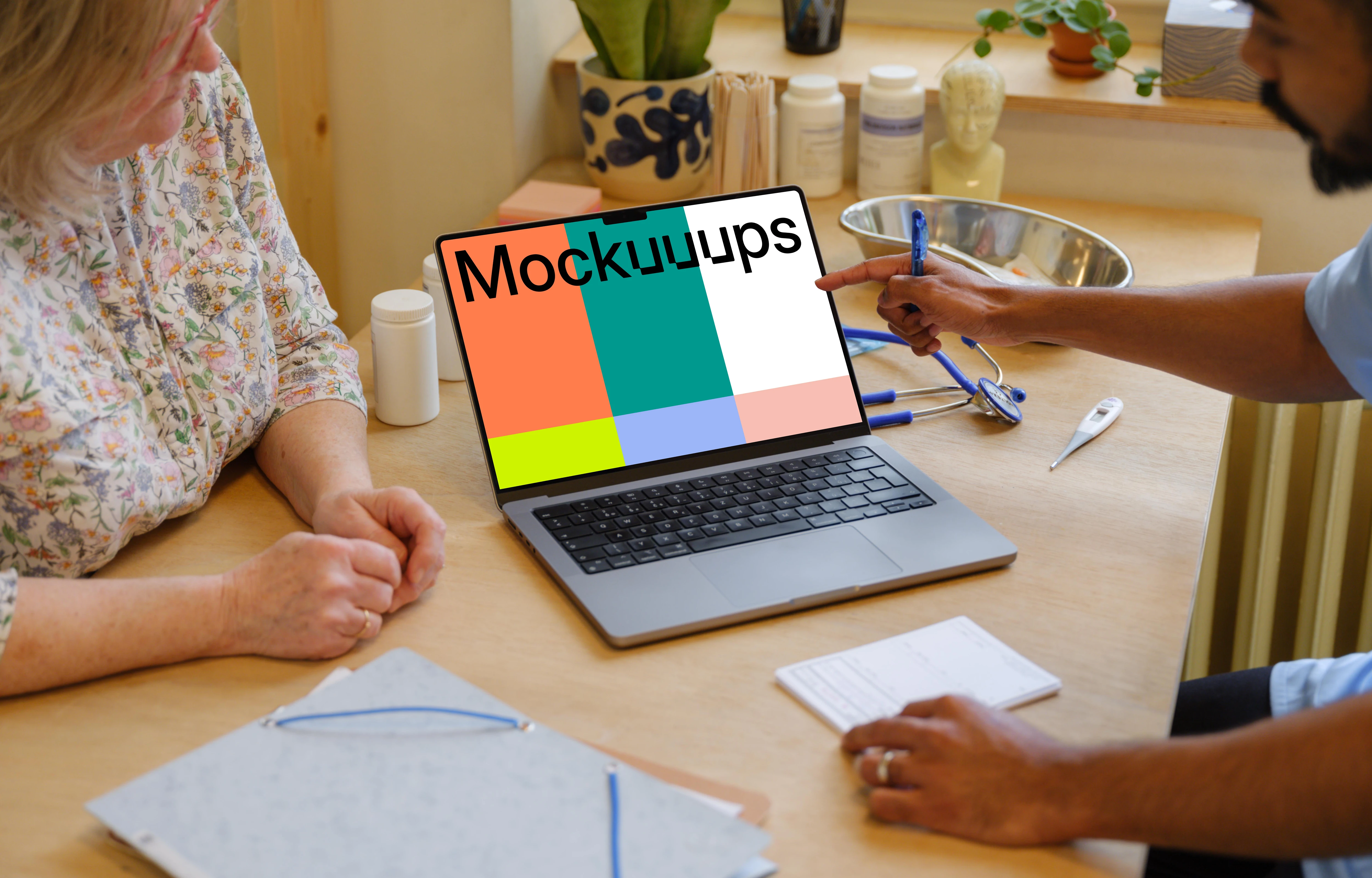 Doctor pointing to MacBook Pro 14" mockup