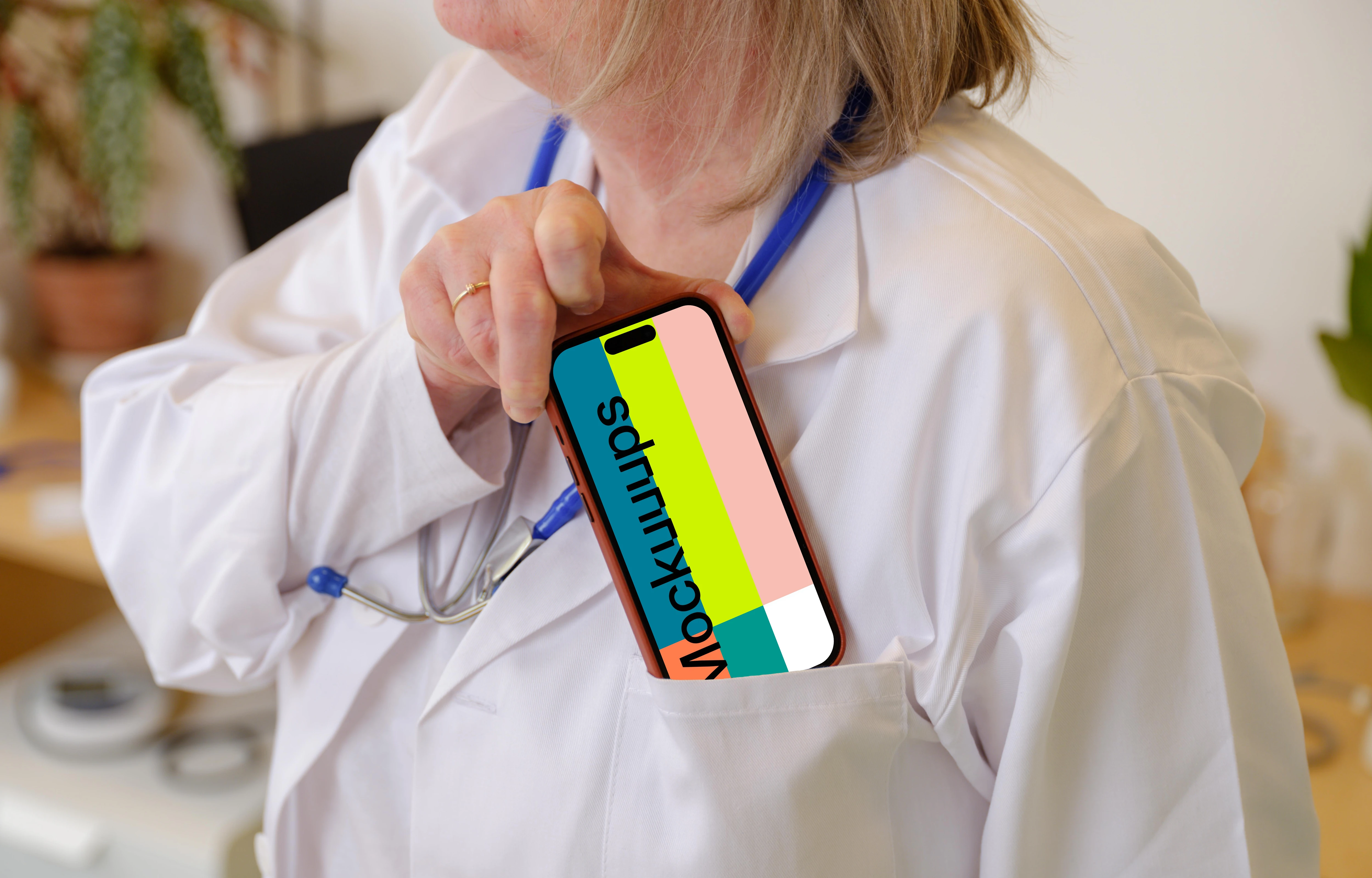 Doctor taking iPhone 14 Pro from her pocket