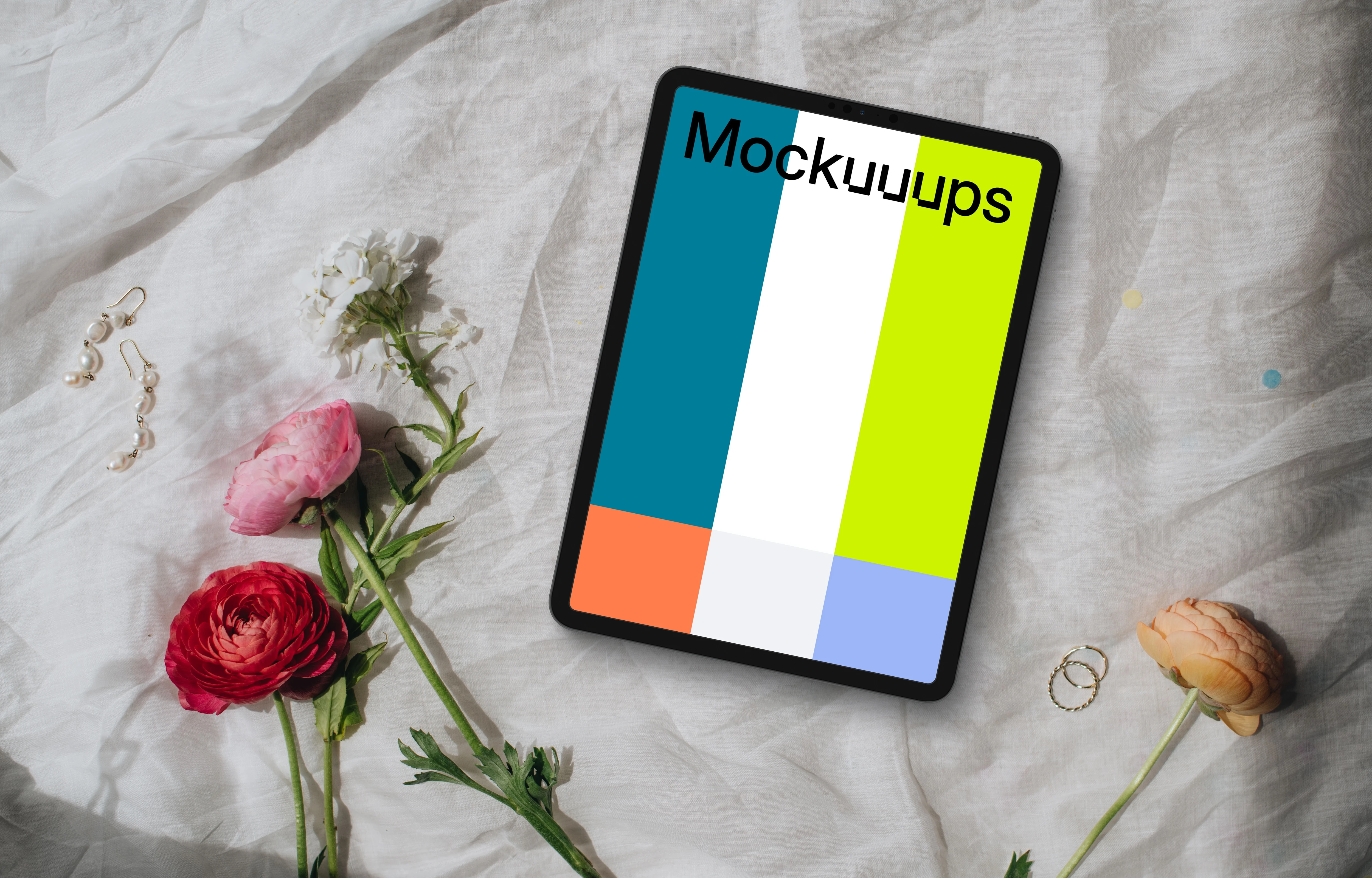 Elegantly arranged wedding setup with iPad mockup