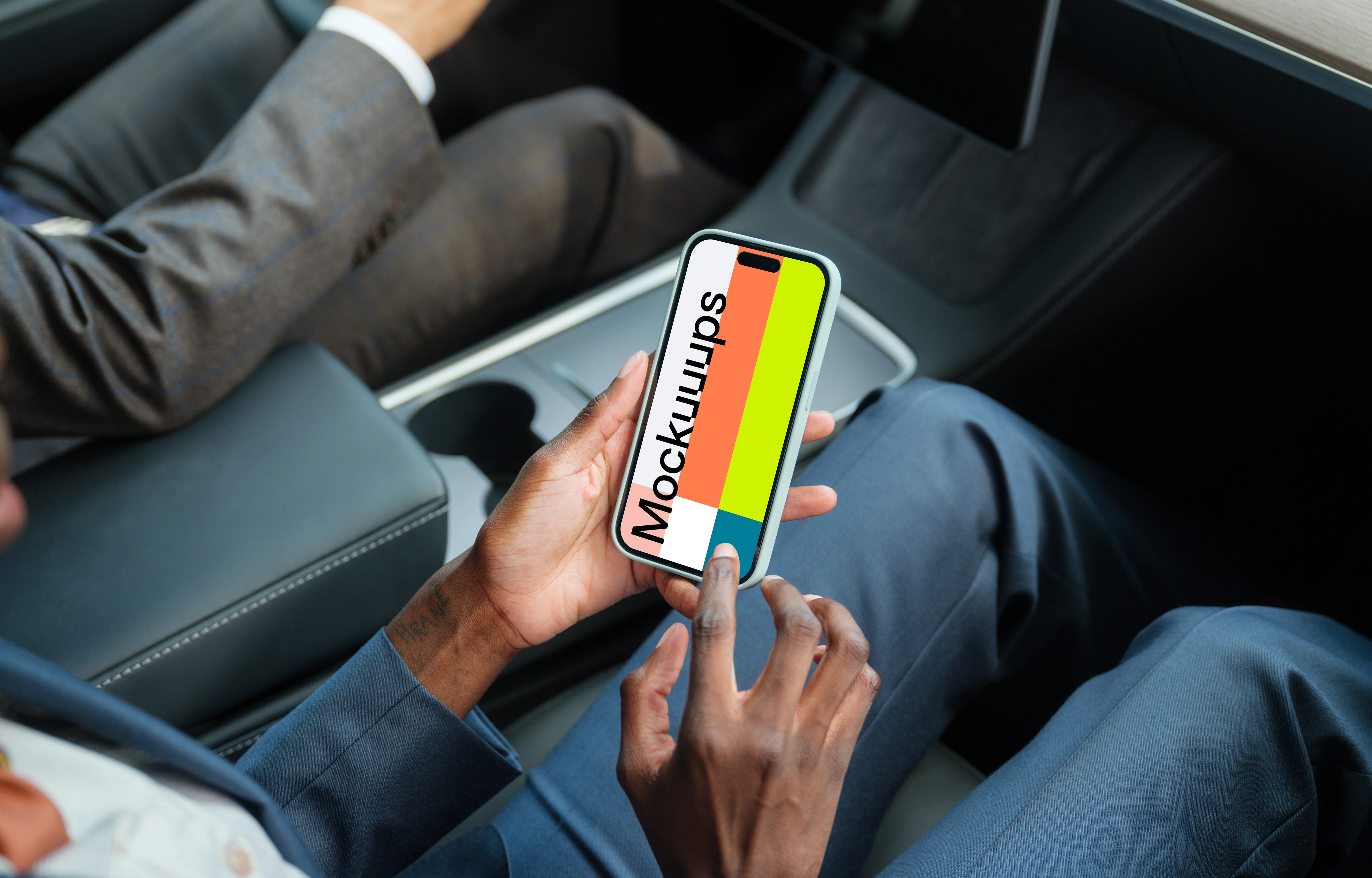 Entrepreneurs in Tesla with iPhone 14 Pro mockup