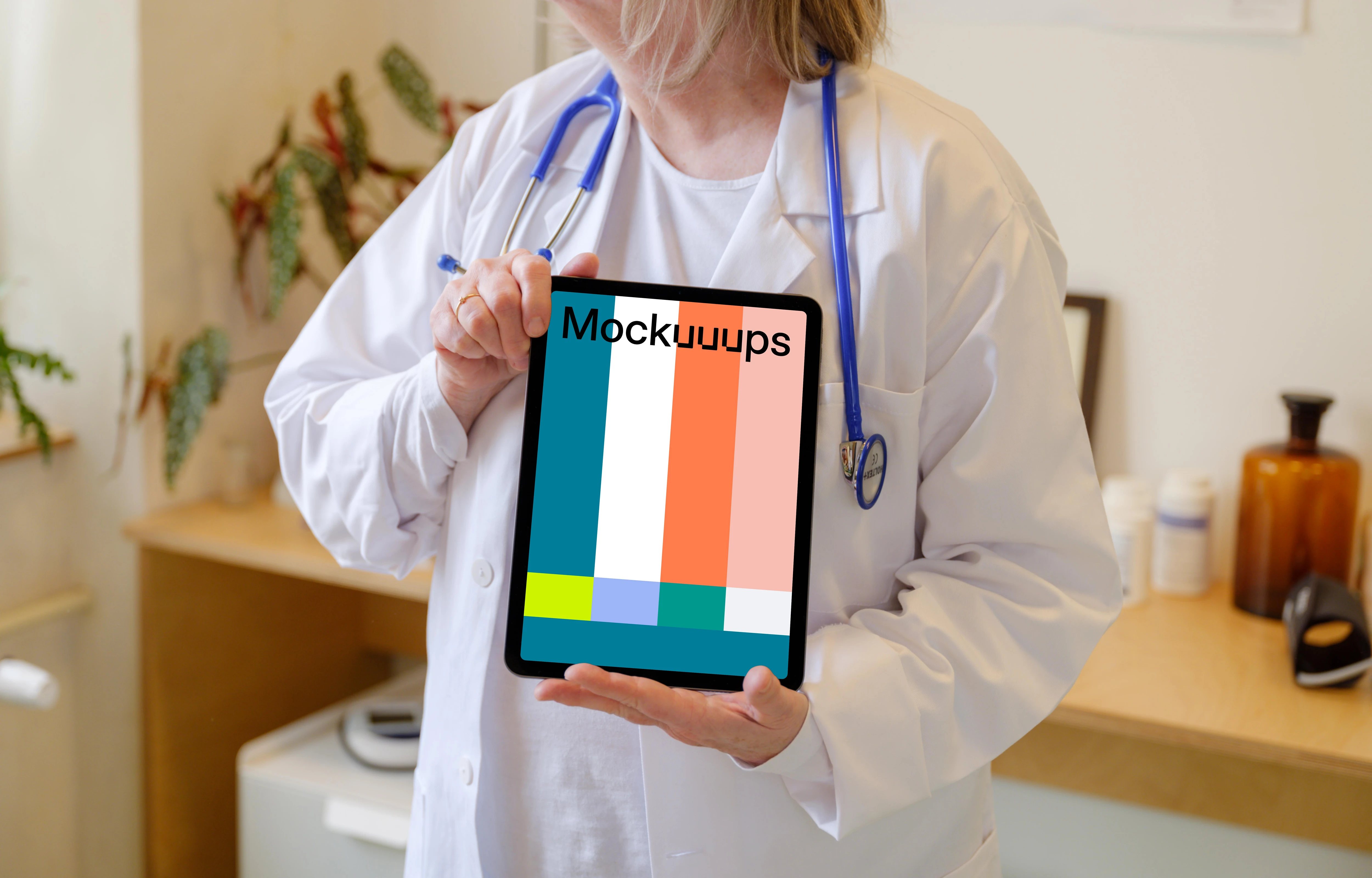 Female doctor holding an iPad Air mockup
