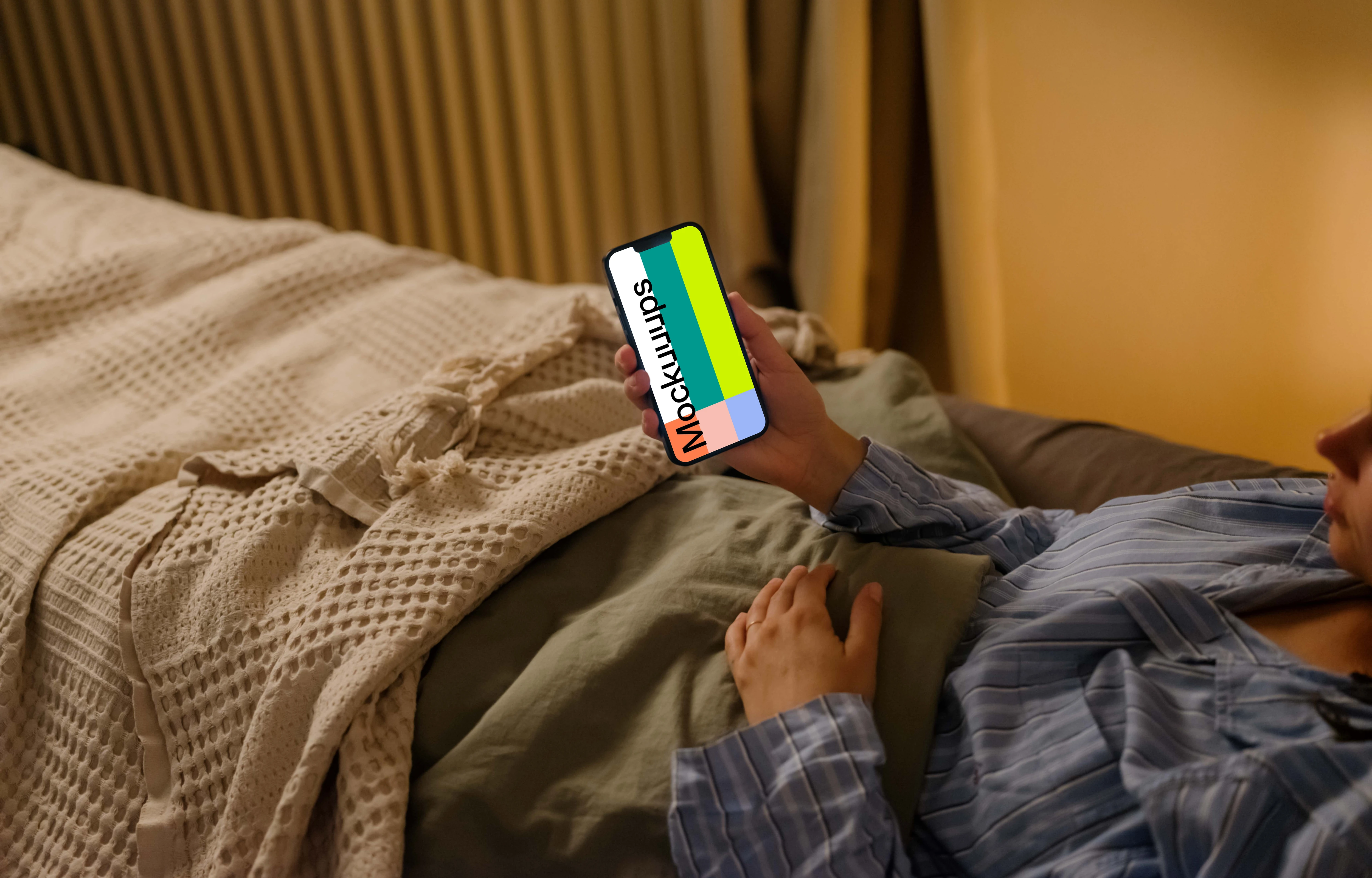 Female hand holding an iPhone mockup