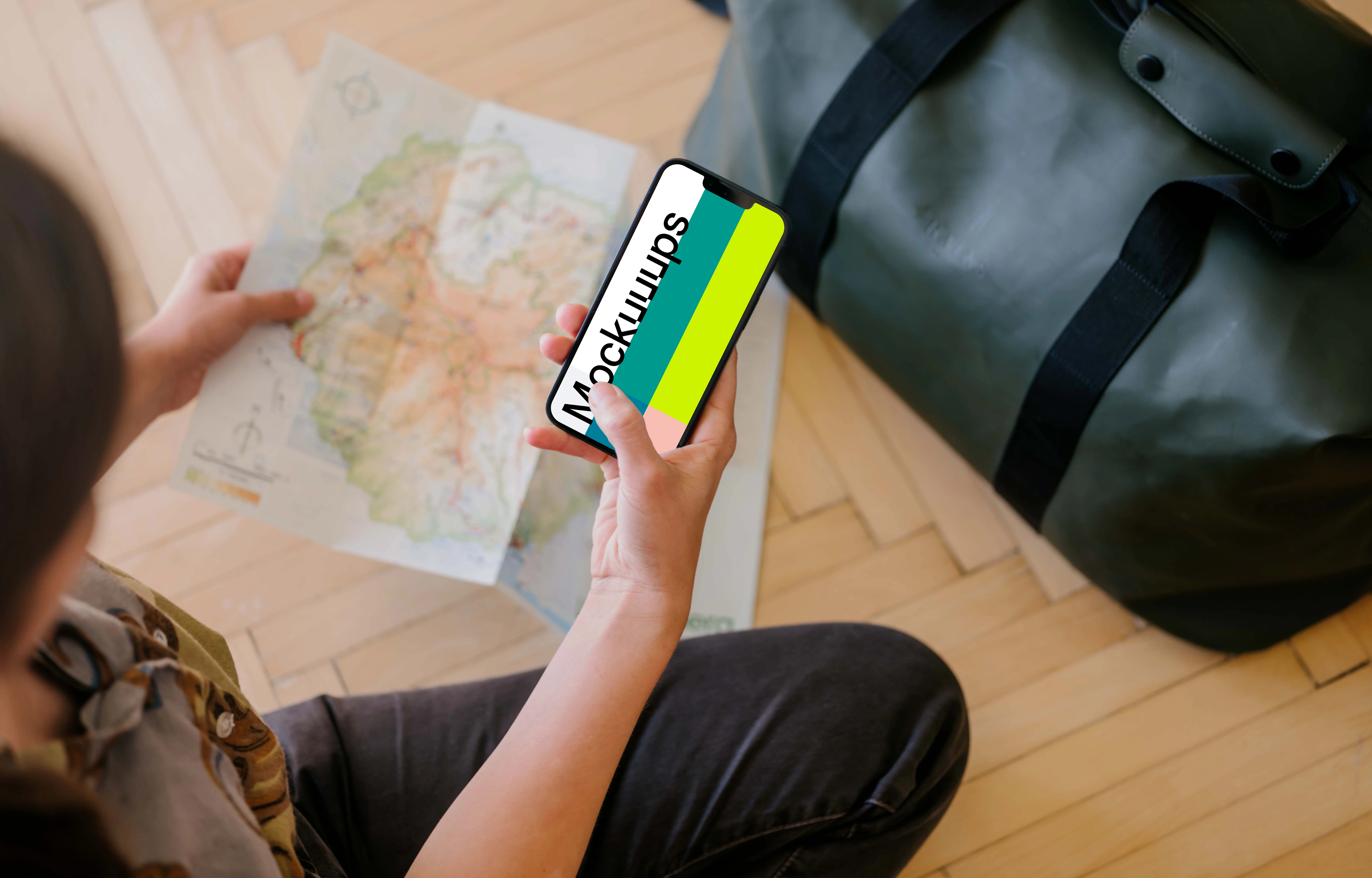 Female hand typing on an iPhone 13 mockup