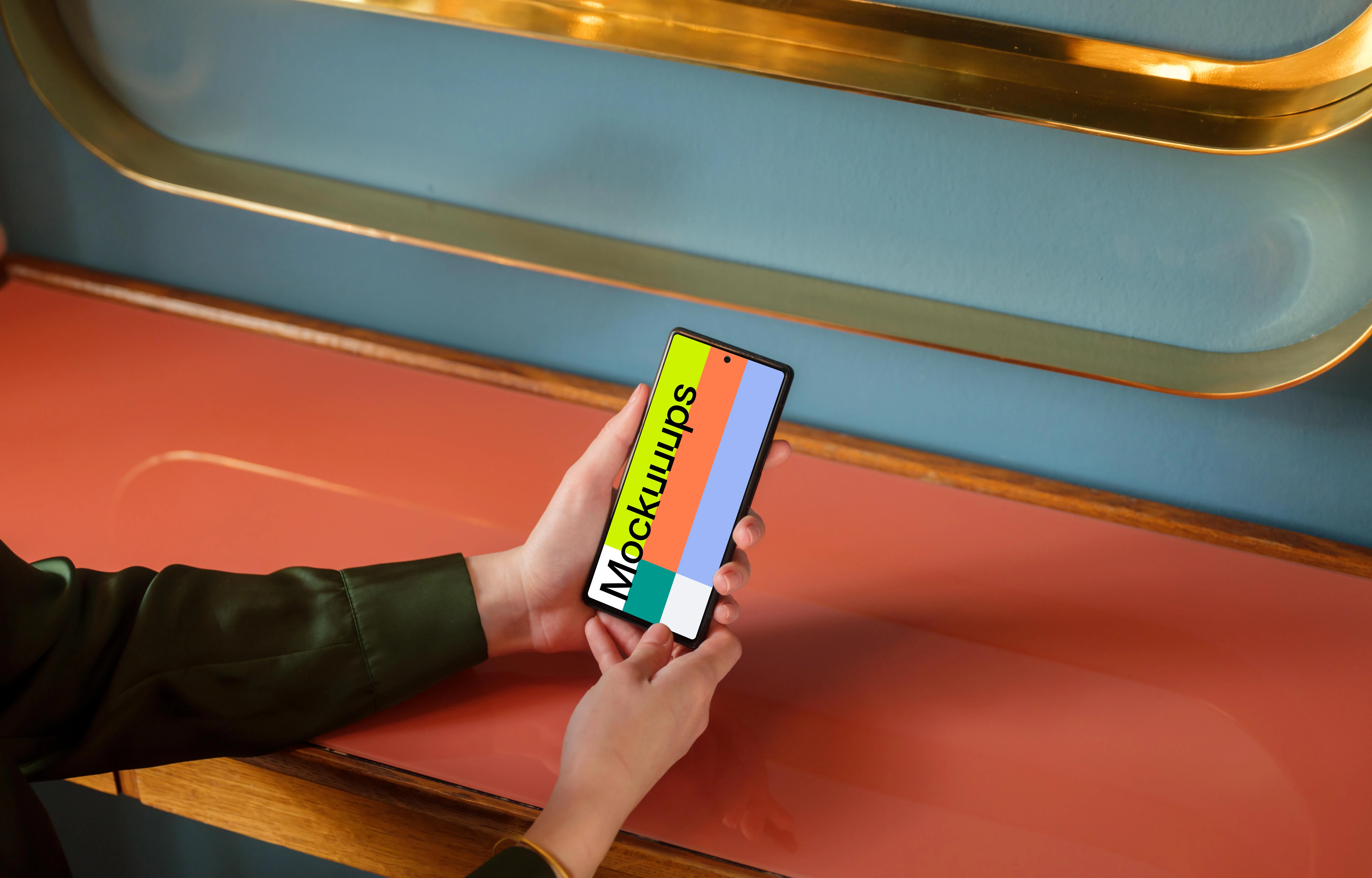 Female holding a Google Pixel mockup in the office