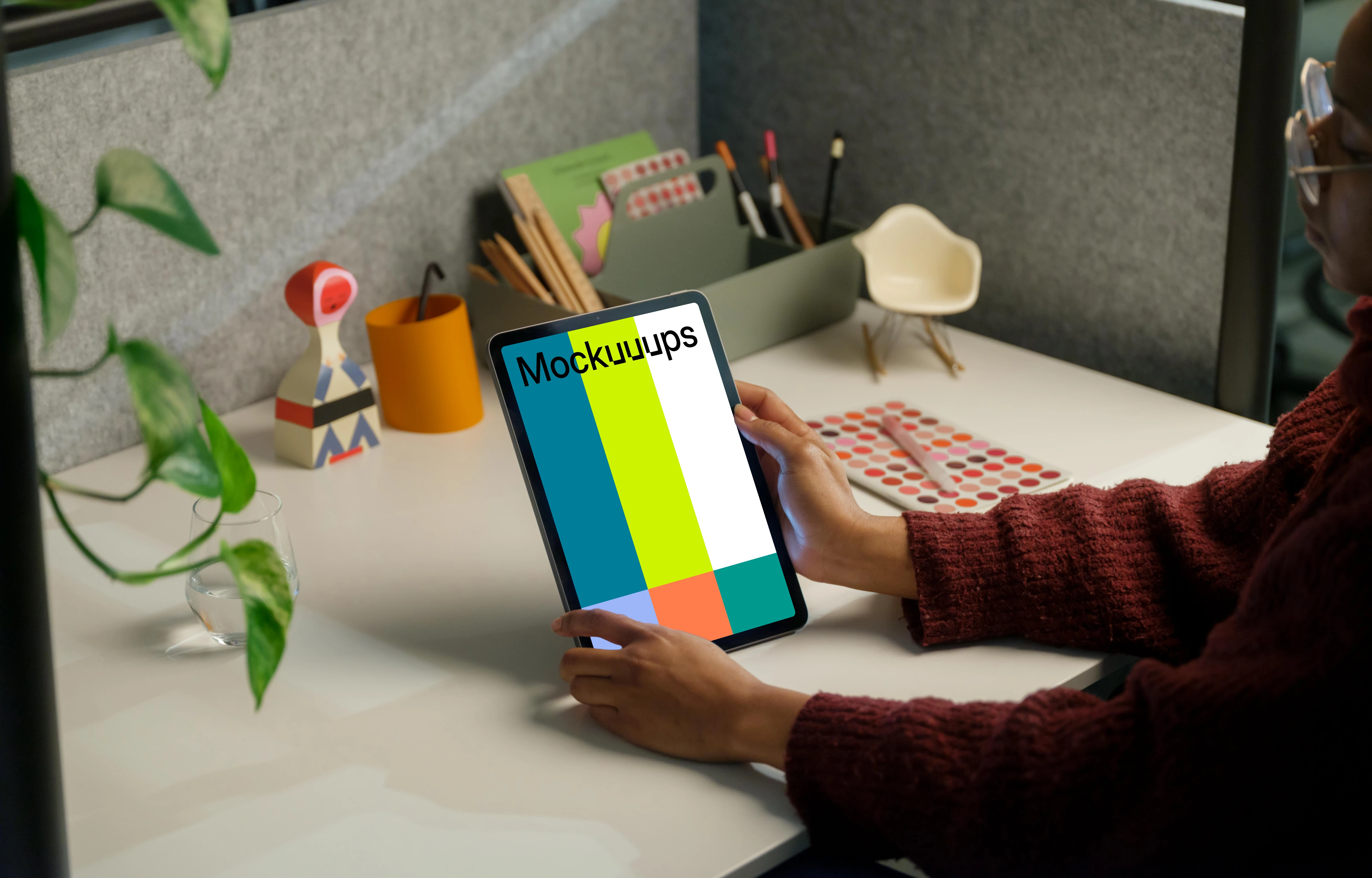 Female holding an iPad Air mockup