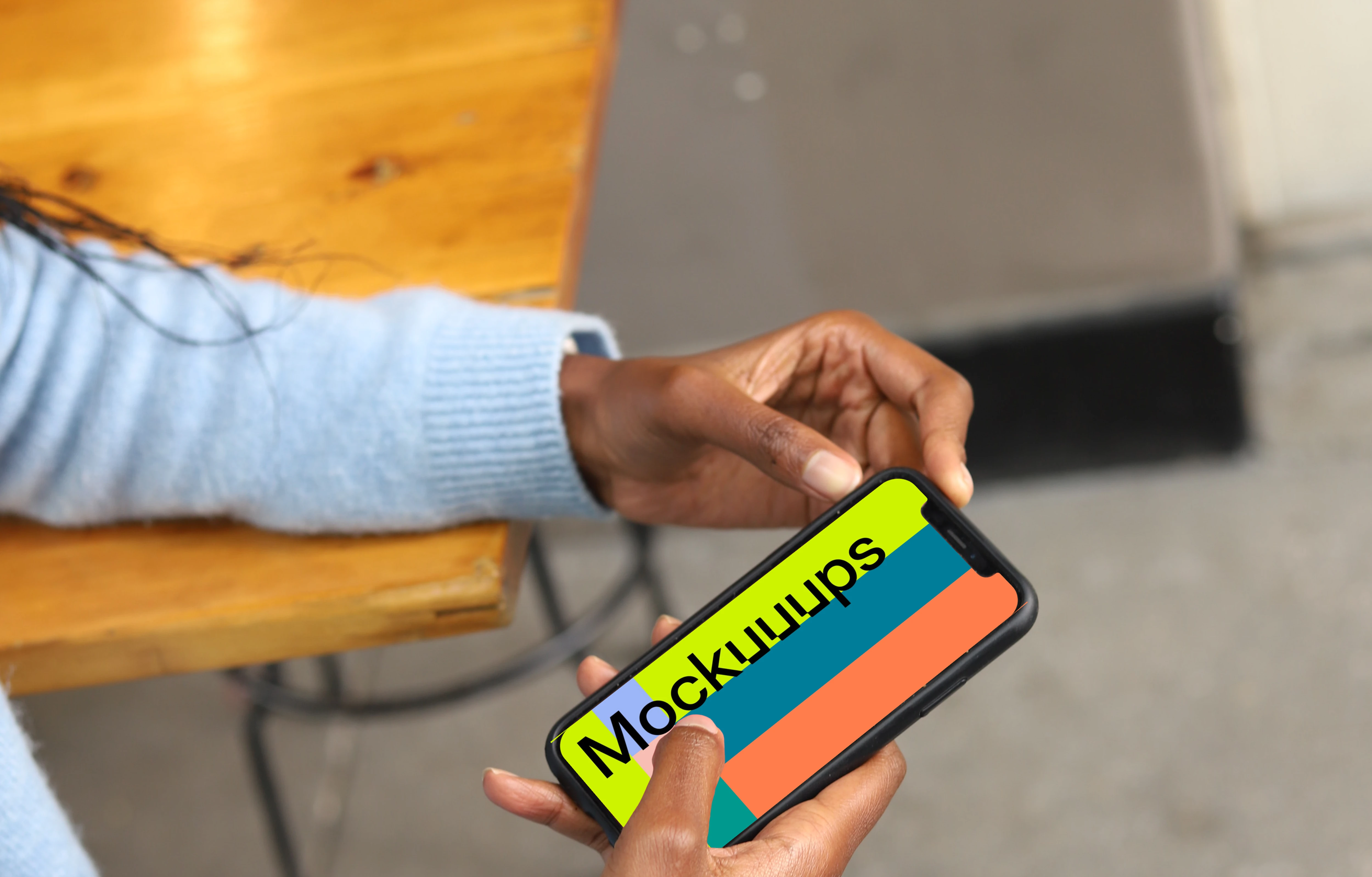 Female pointing on iPhone 12 mockup