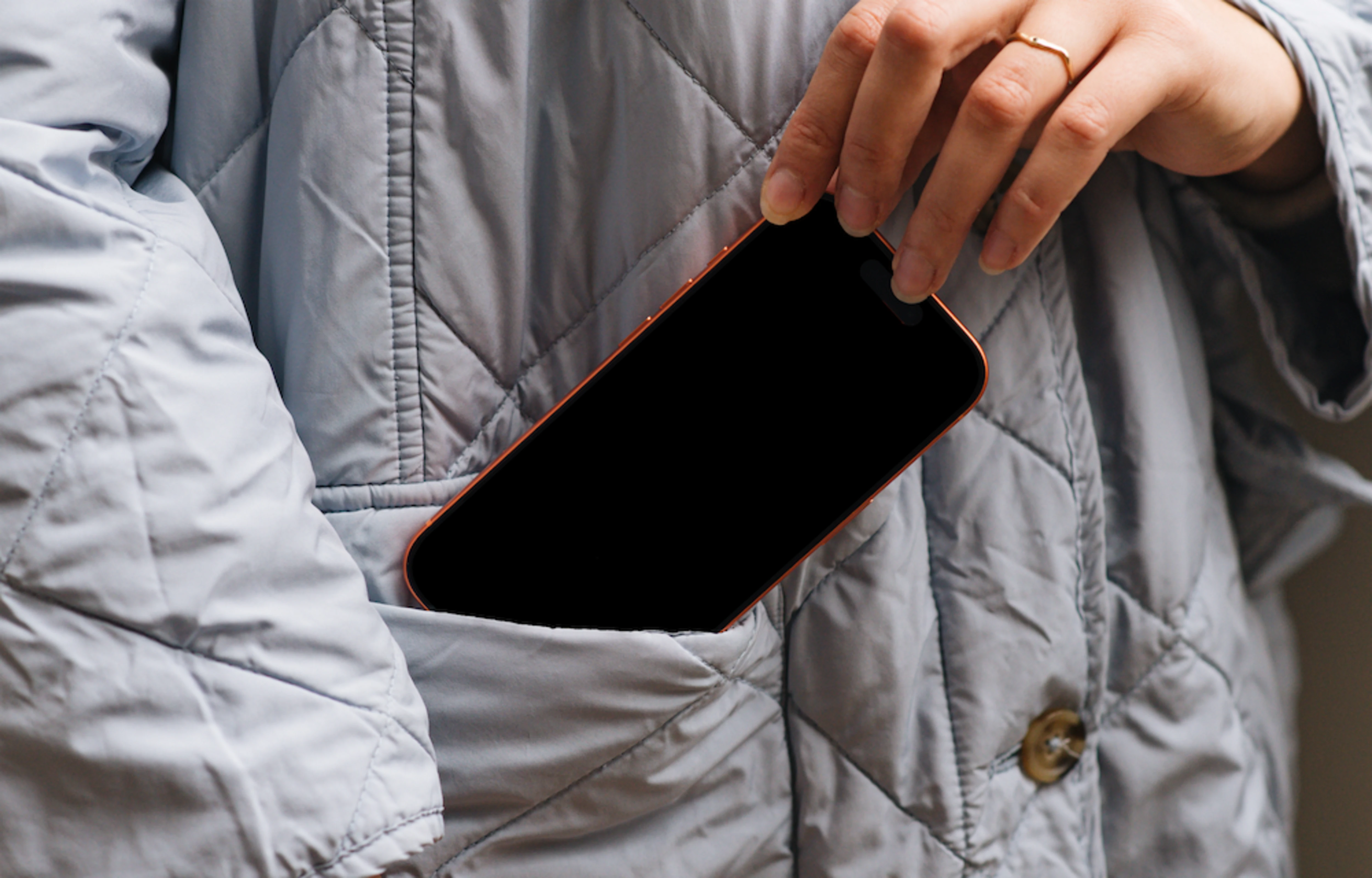 Free iPhone 17 Pro mockup in a jacket pocket