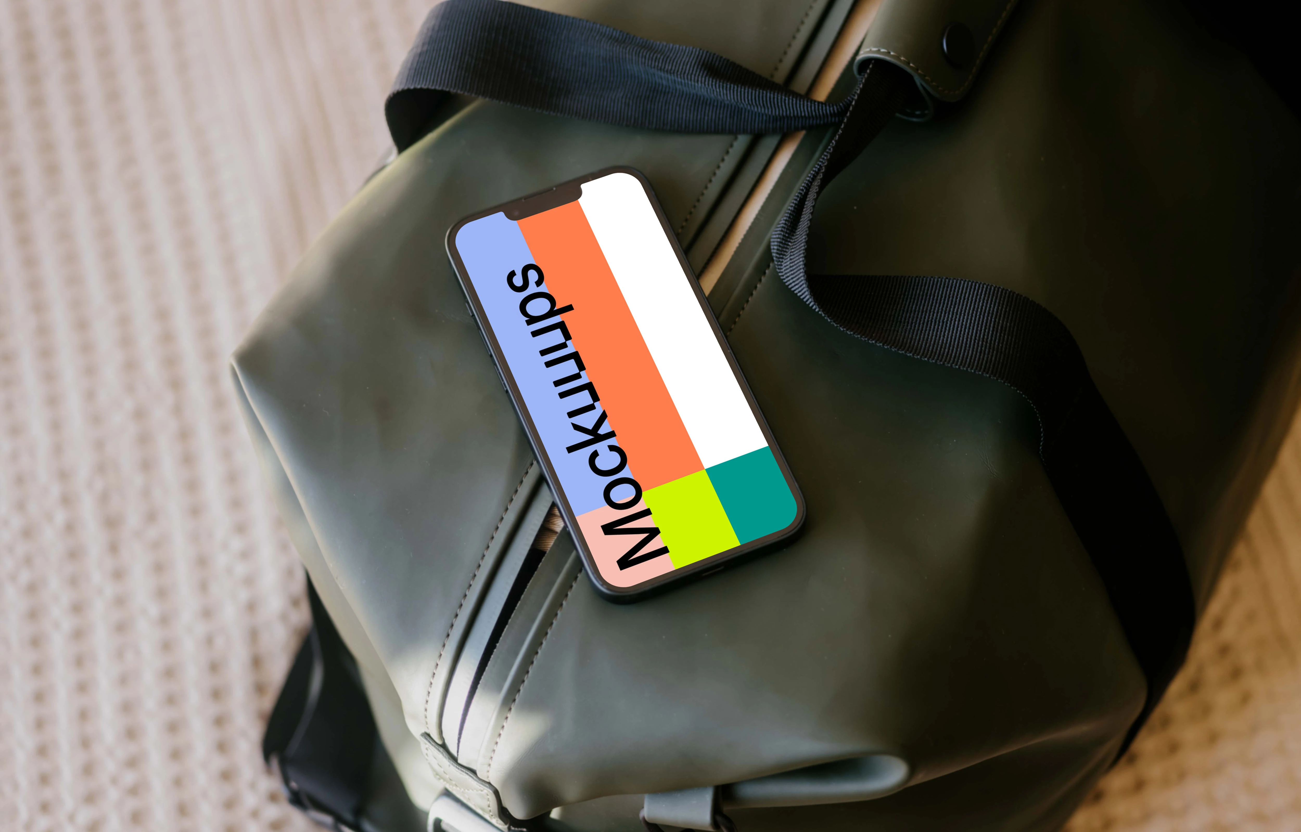 iPhone 13 mockup on travel bag
