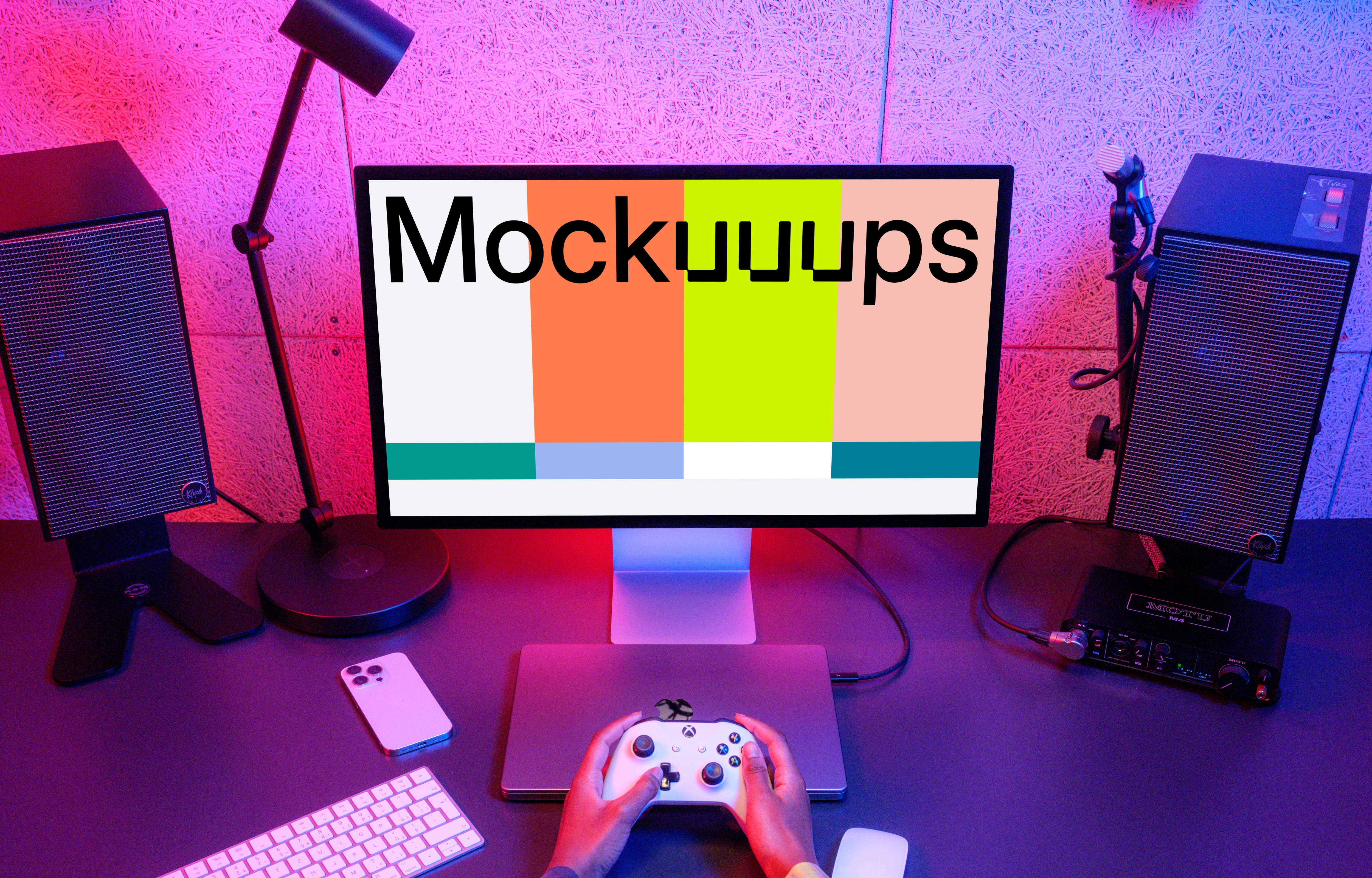 Gamer's desk with Apple Studio Display mockup and peripherals