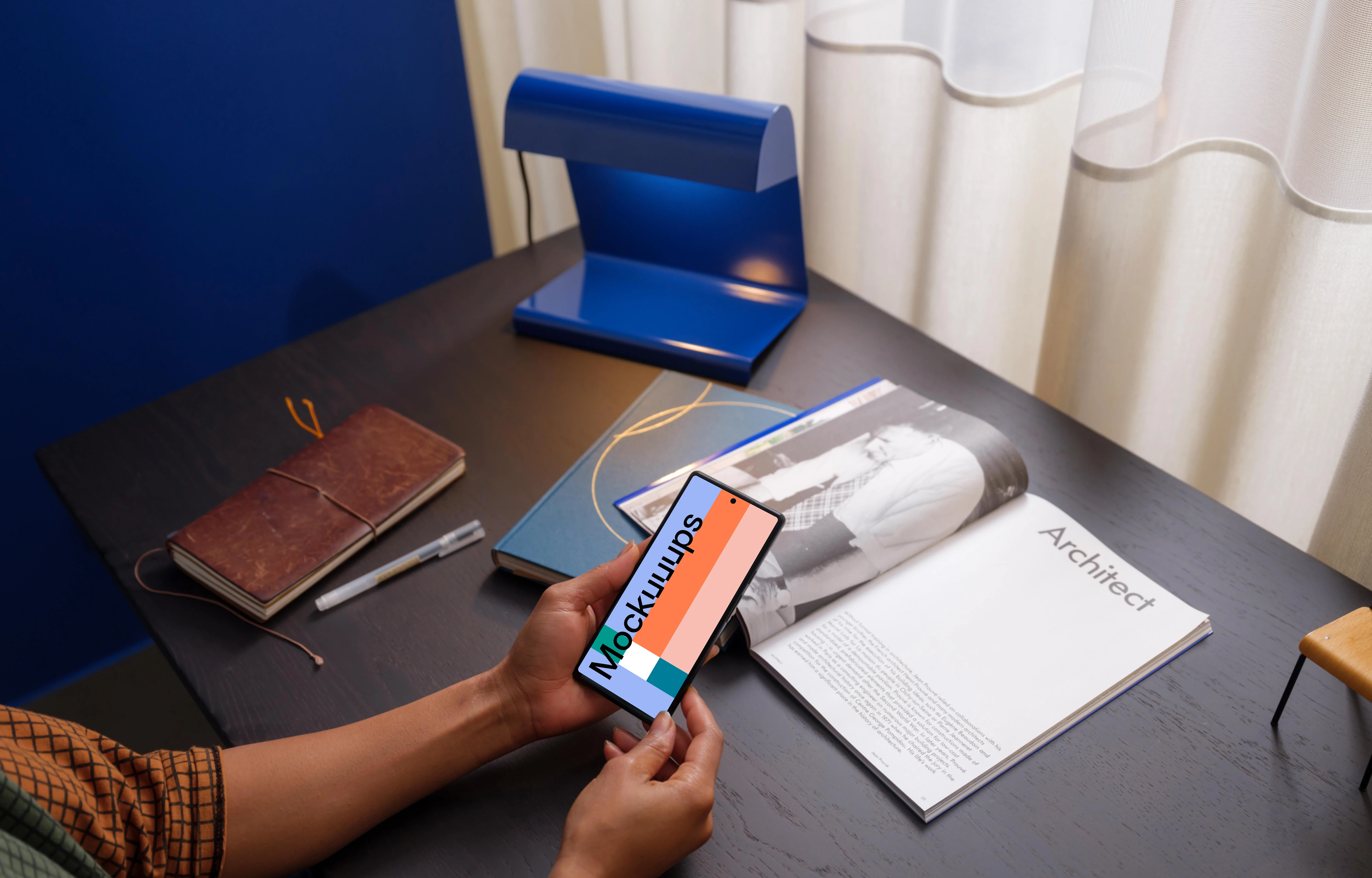 Woman holding a Google Pixel 6 mockup