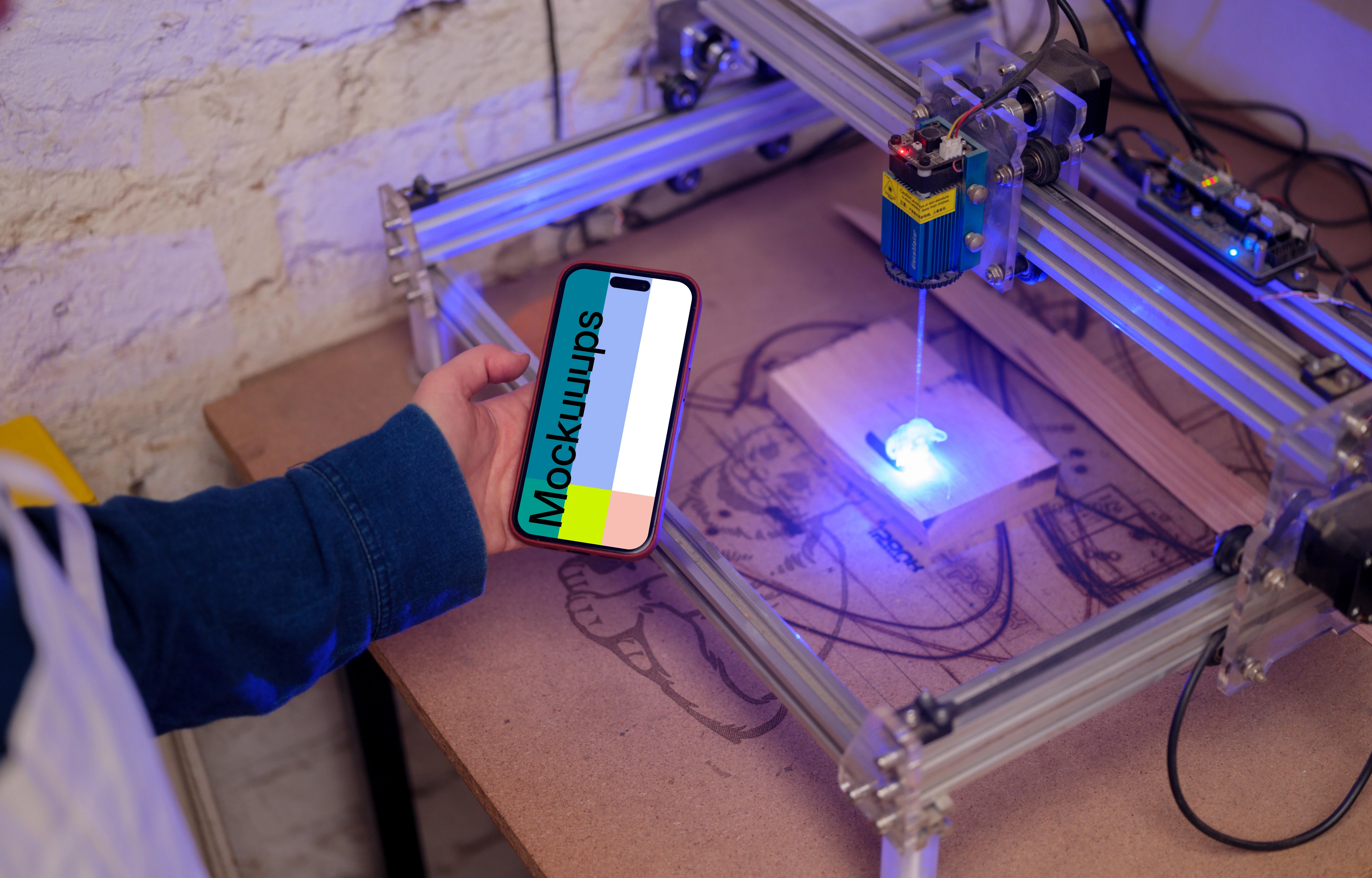 Hand holding an iPhone 14 Pro mockup