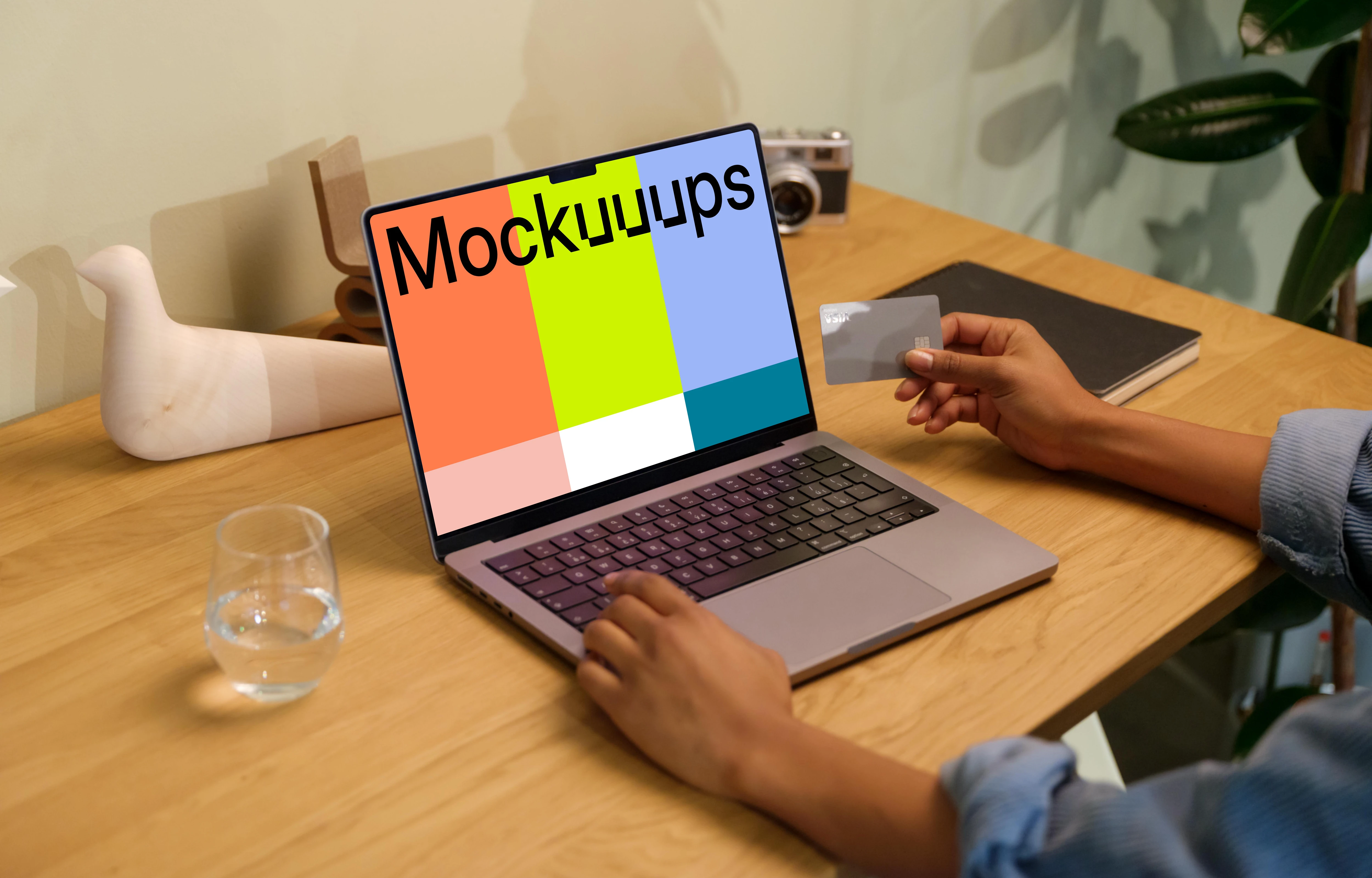Hand typing on a MacBook Pro mockup