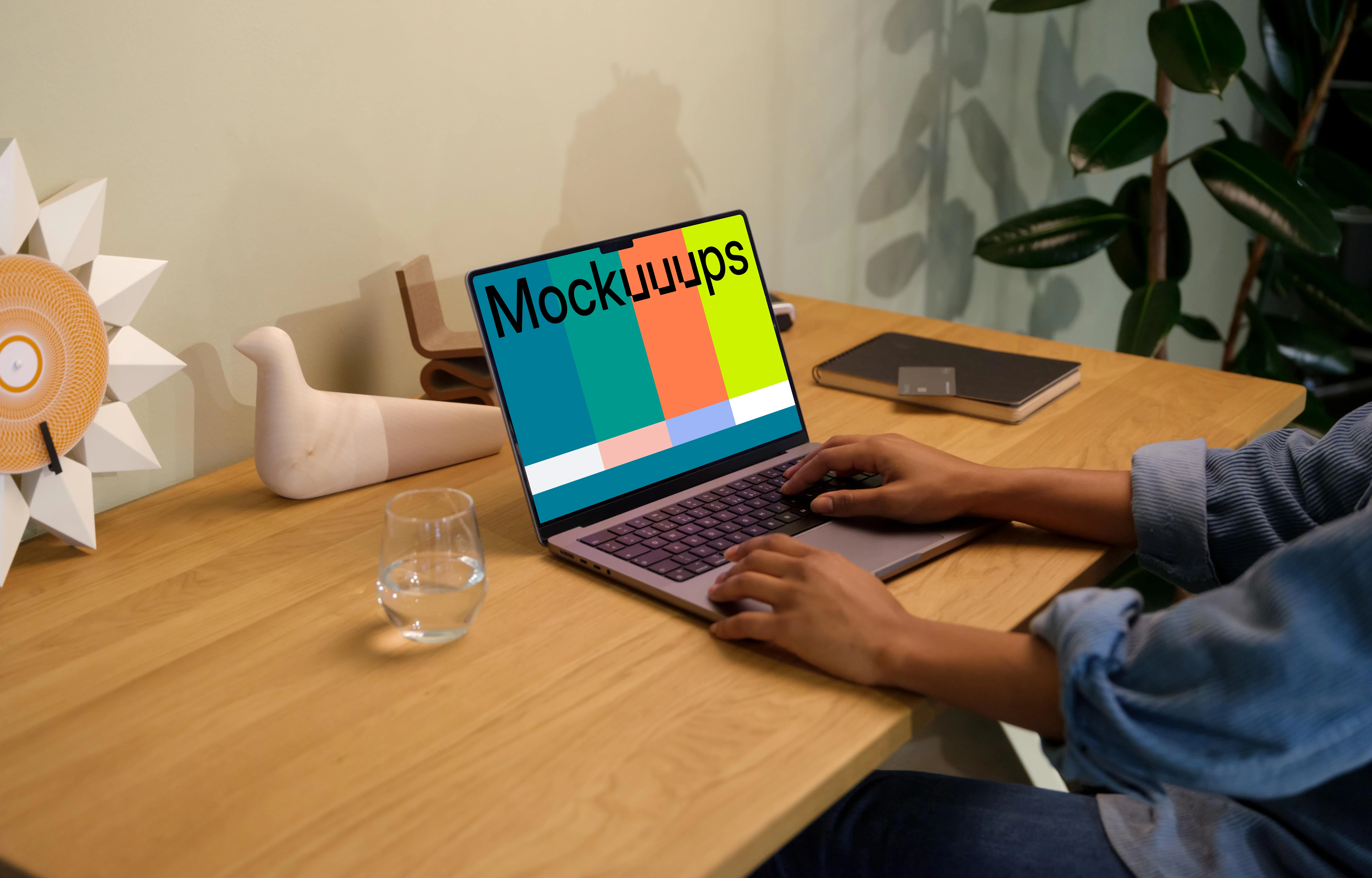 Hands typing on a MacBook Pro 14 mockup
