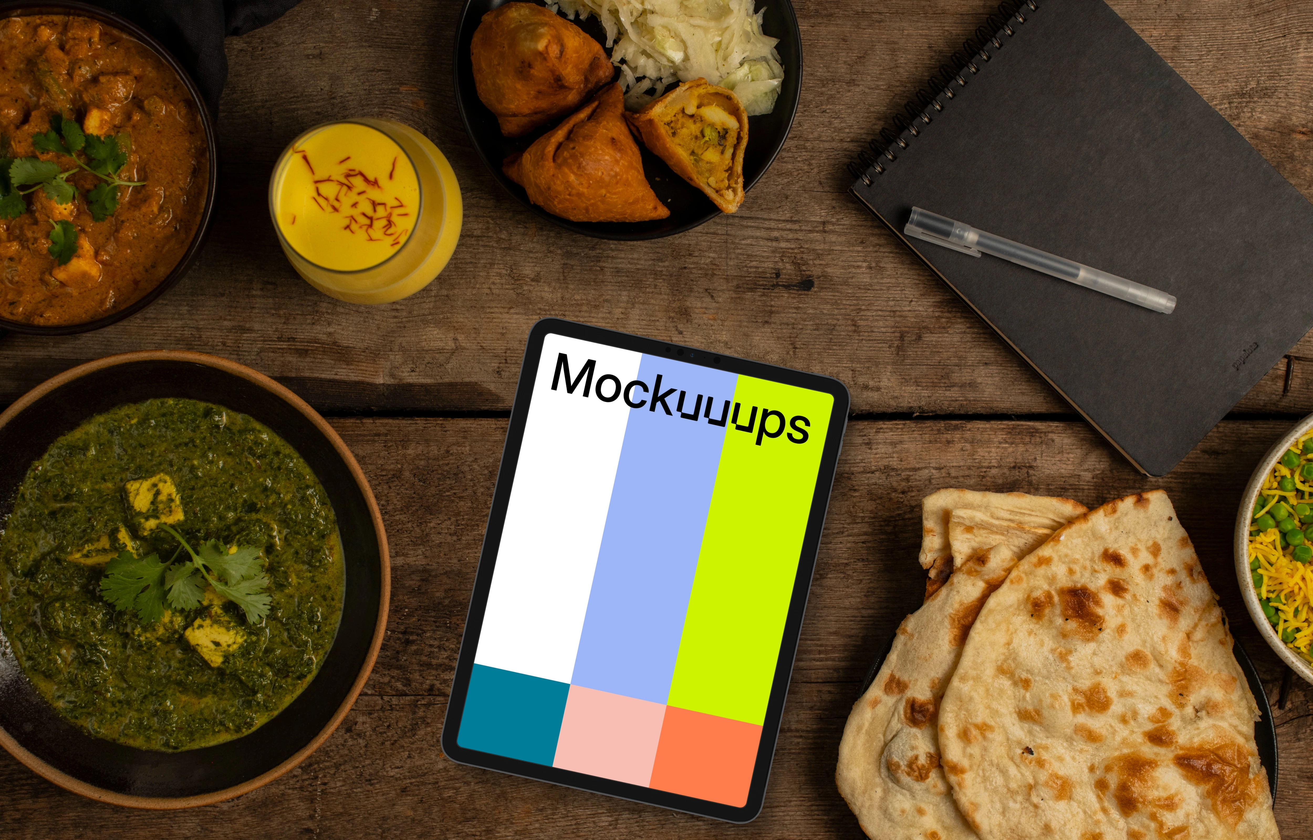 Indian food around tablet mockup