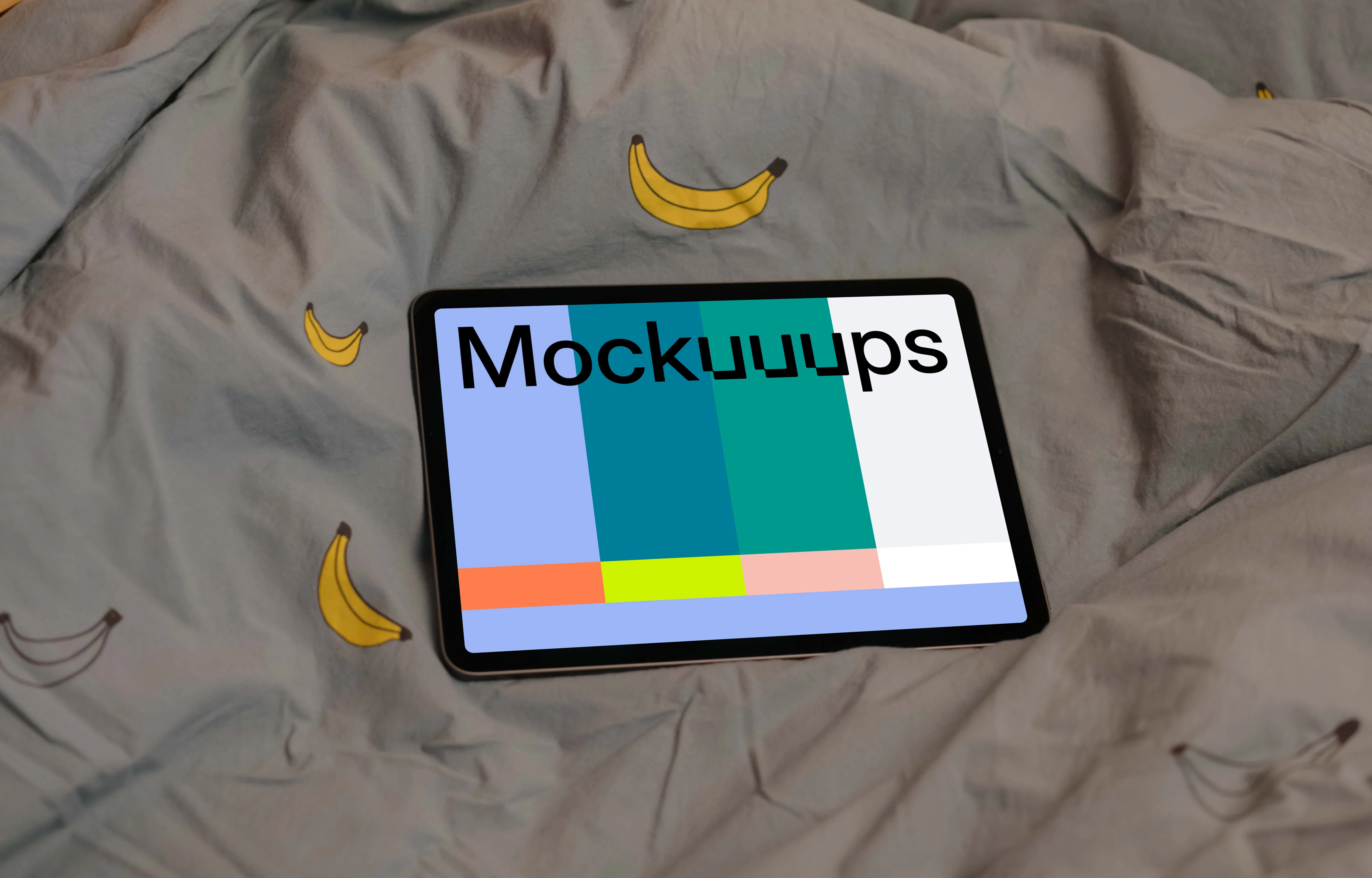 iPad Air mockup on bed sheets 