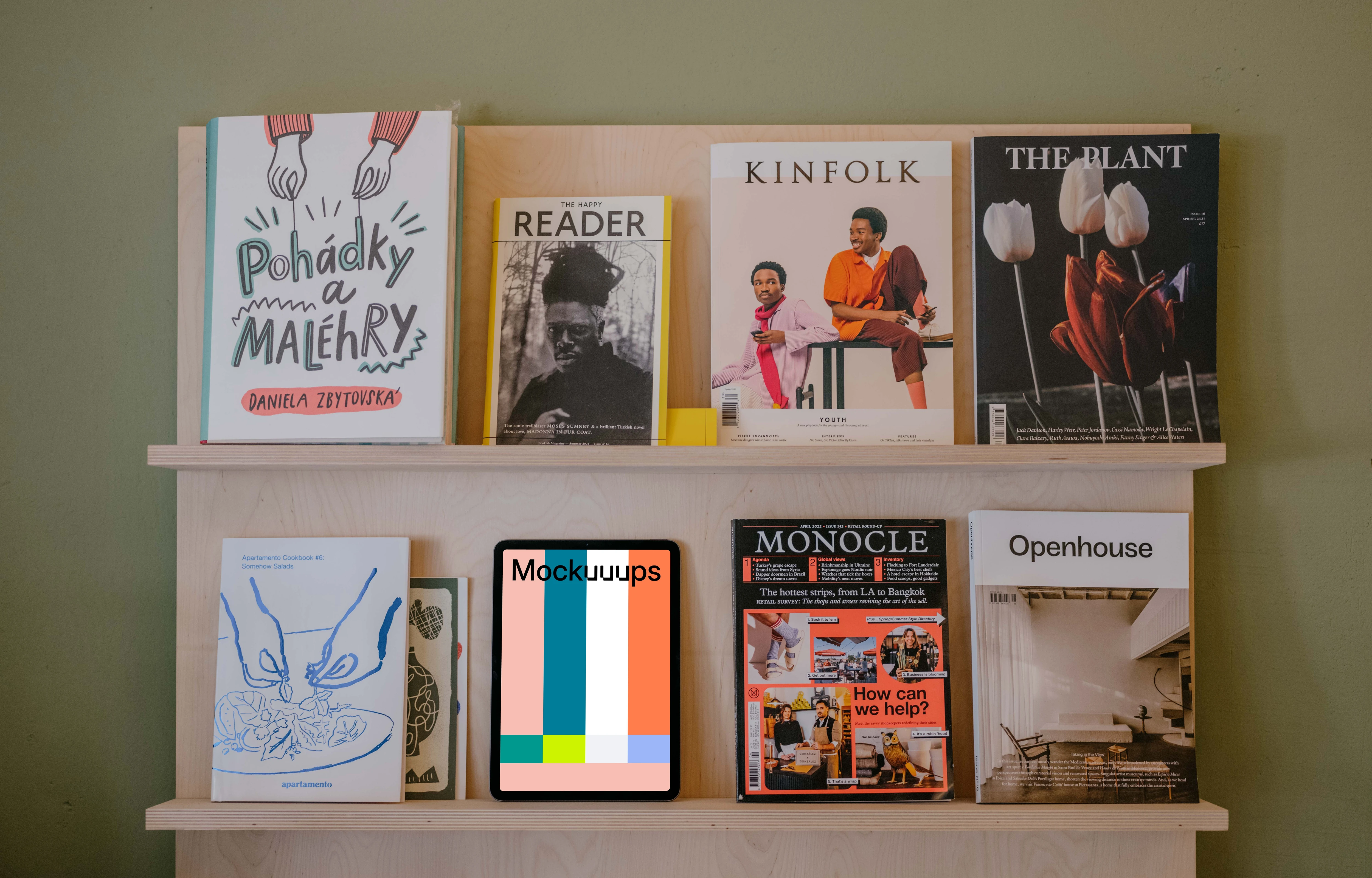iPad Air mockup on the wall with magazines