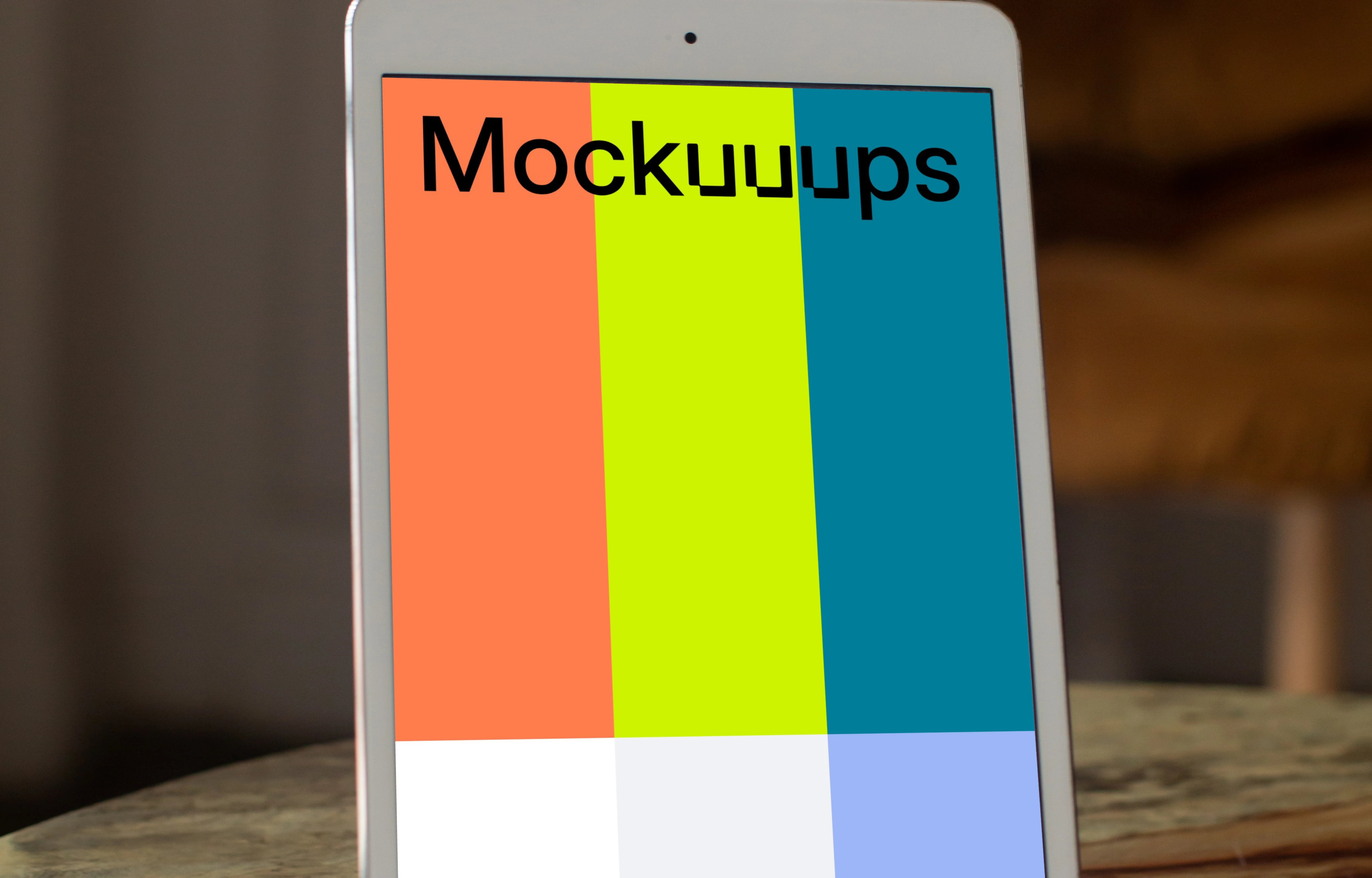 iPad Mini mockup on a stand with a chair in the background