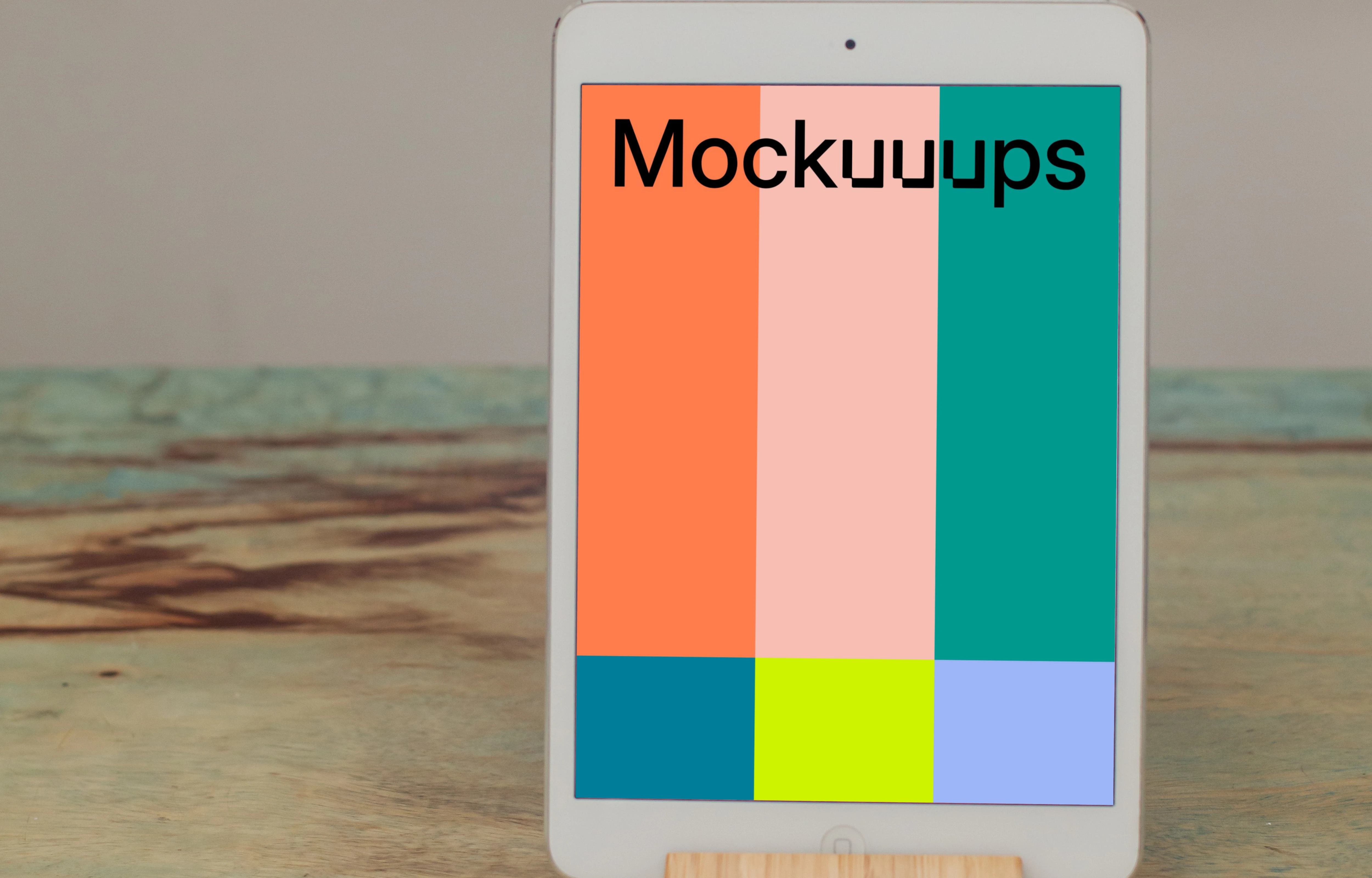iPad Mini mockup placed on a wooden stand in potrait mode