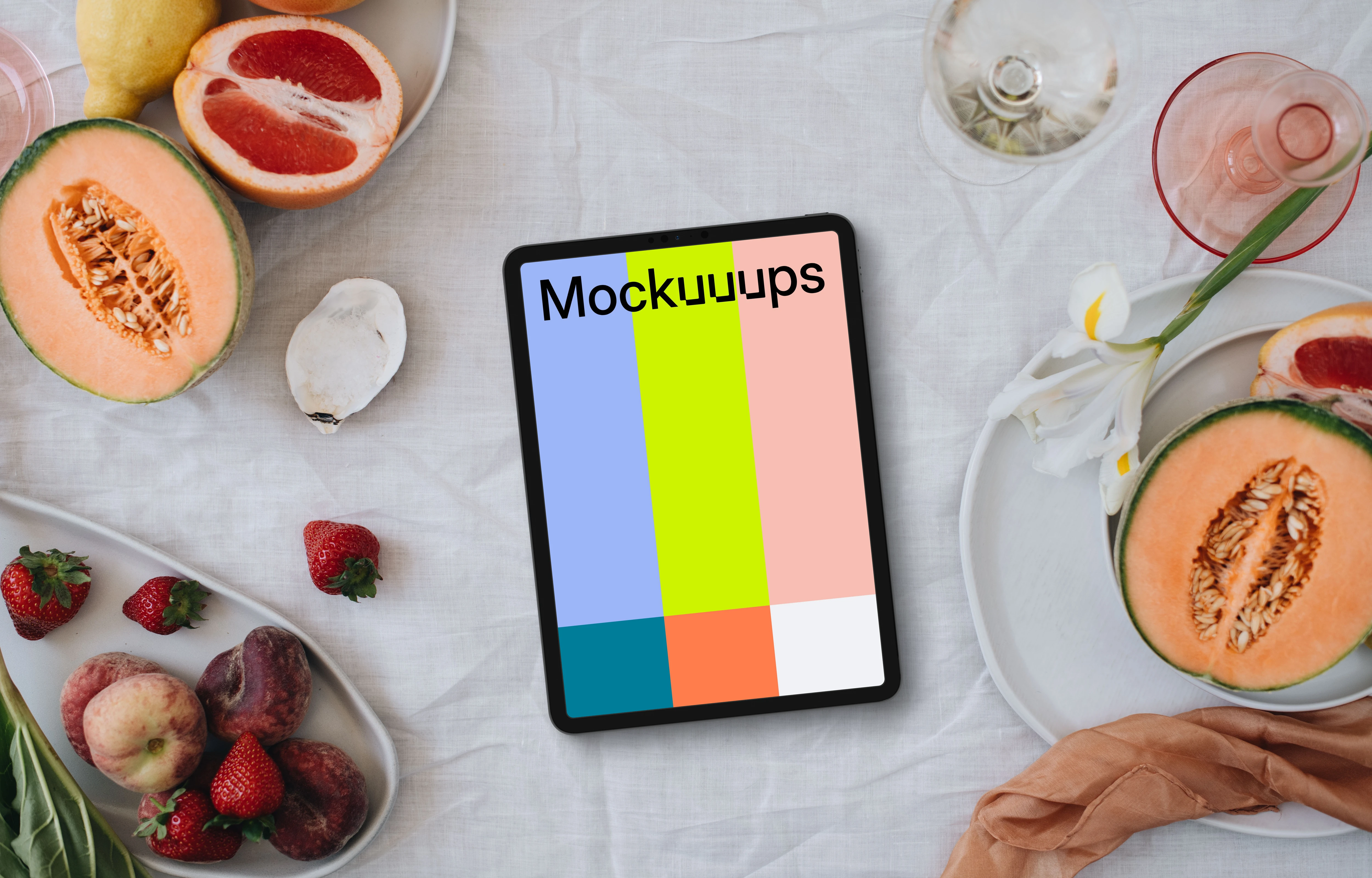 iPad mockup complemented by wedding-themed decor