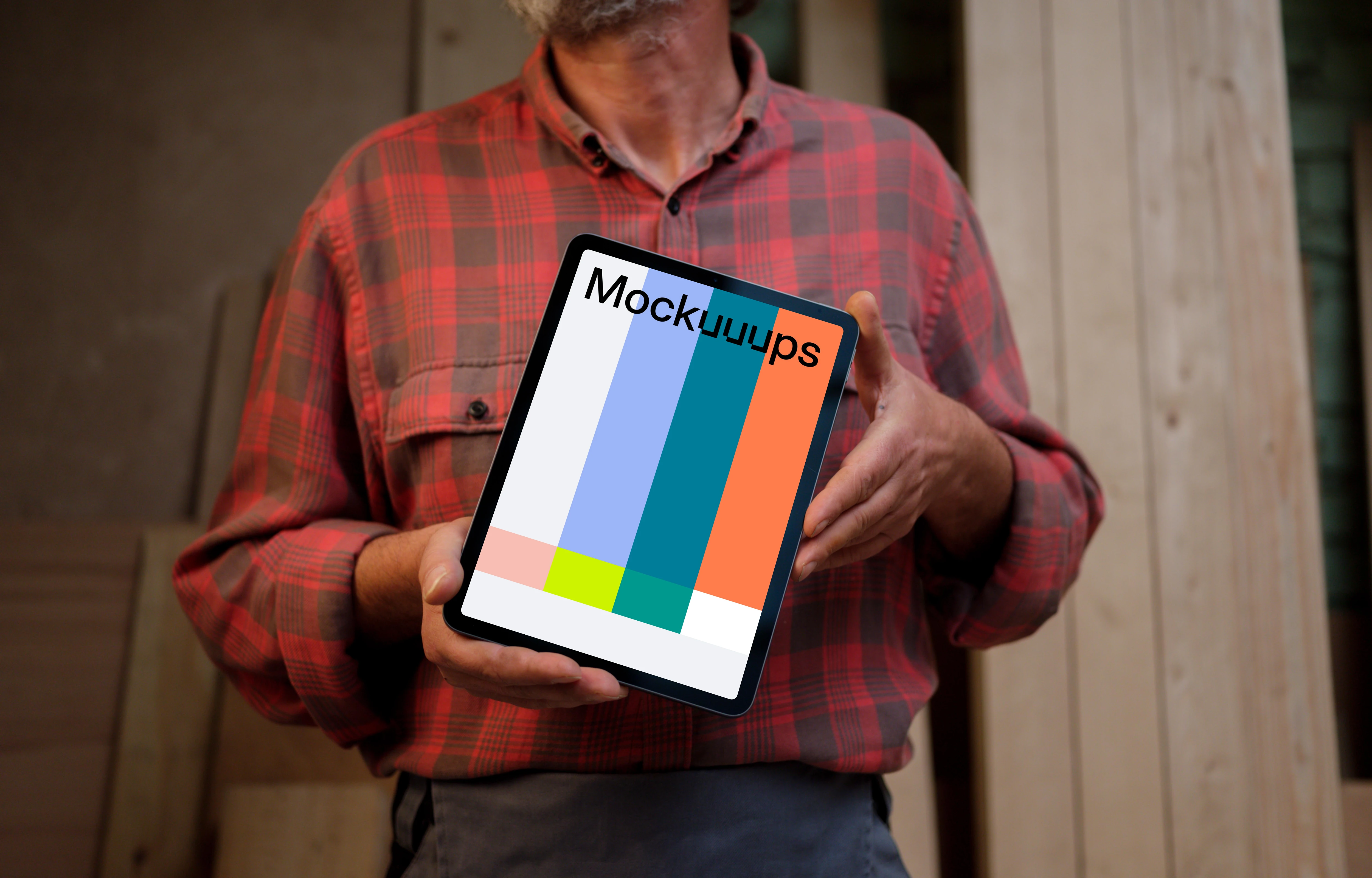 iPad mockup in man hands