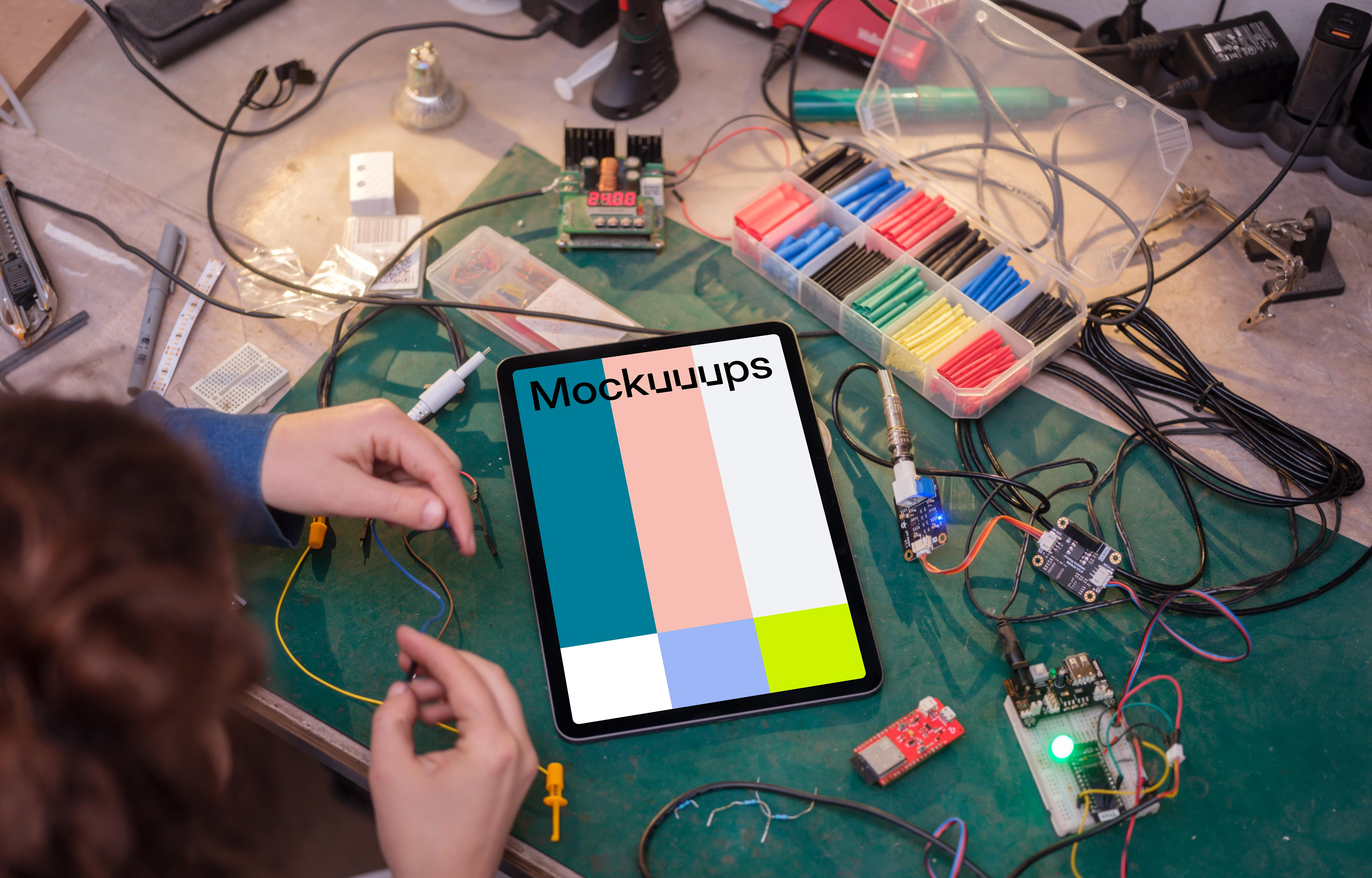 iPad mockup next to the cables