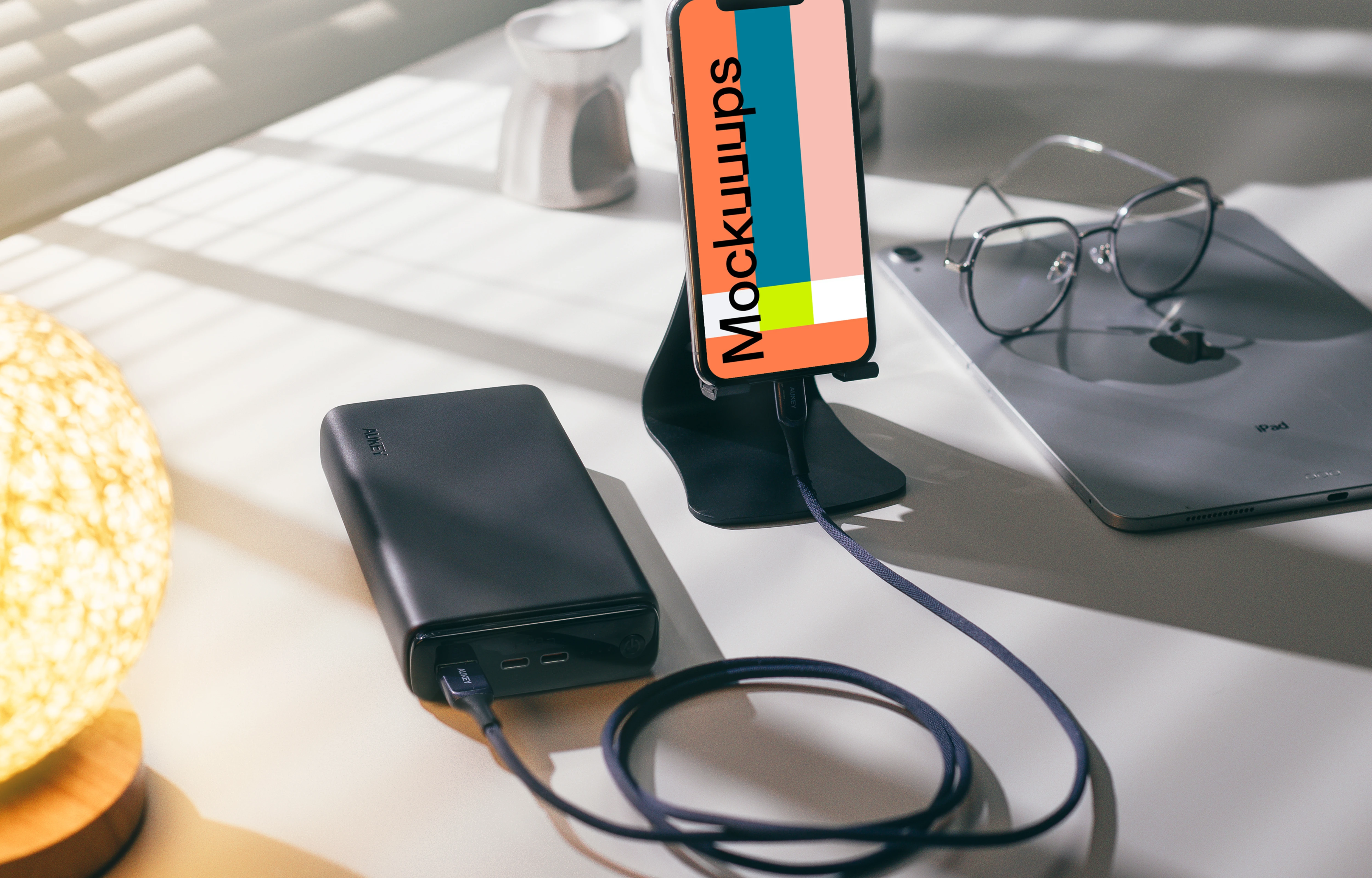 iPhone 12 mockup held on a phone-stand