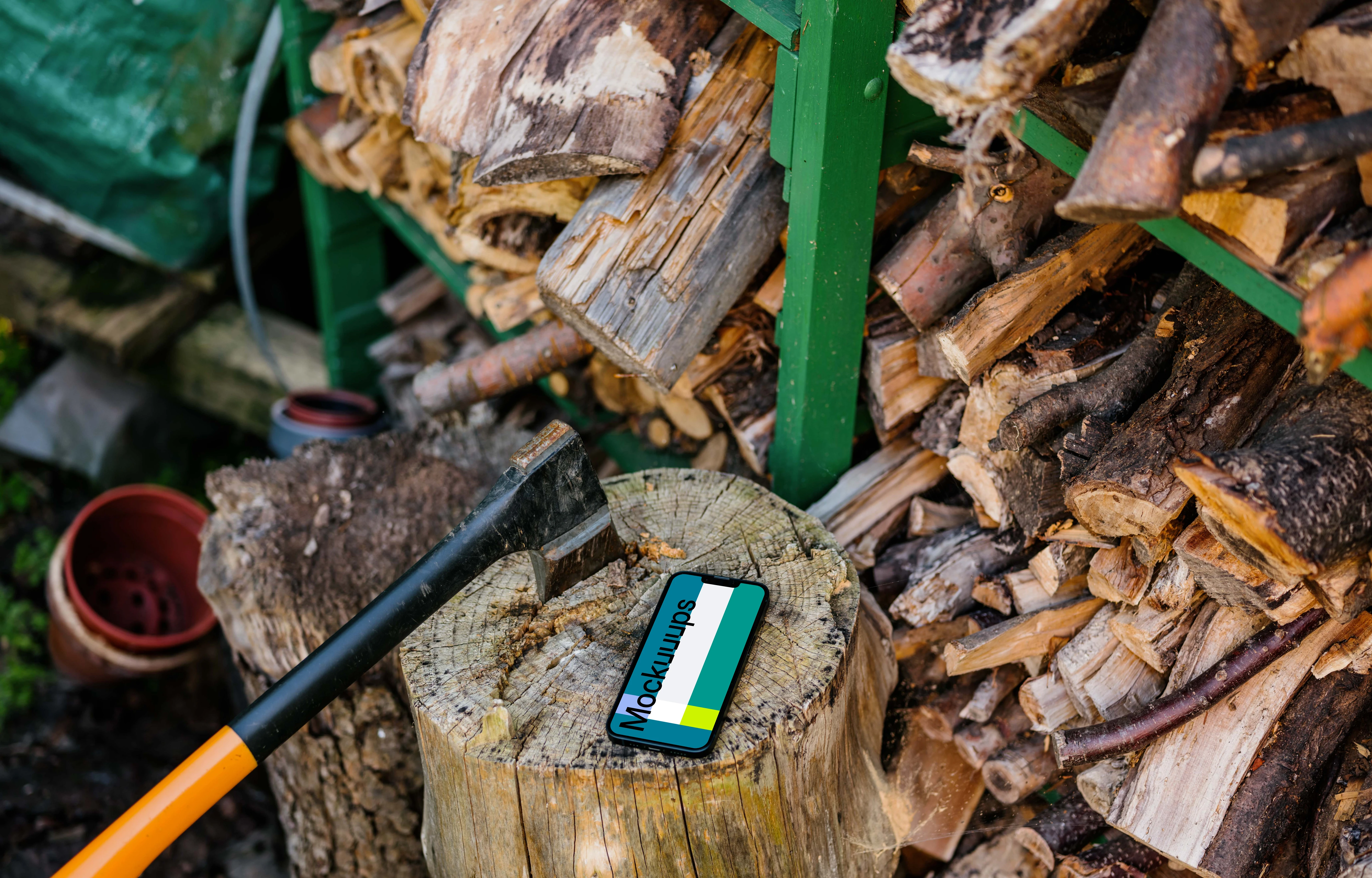 iPhone 13 mockup on a tree stump