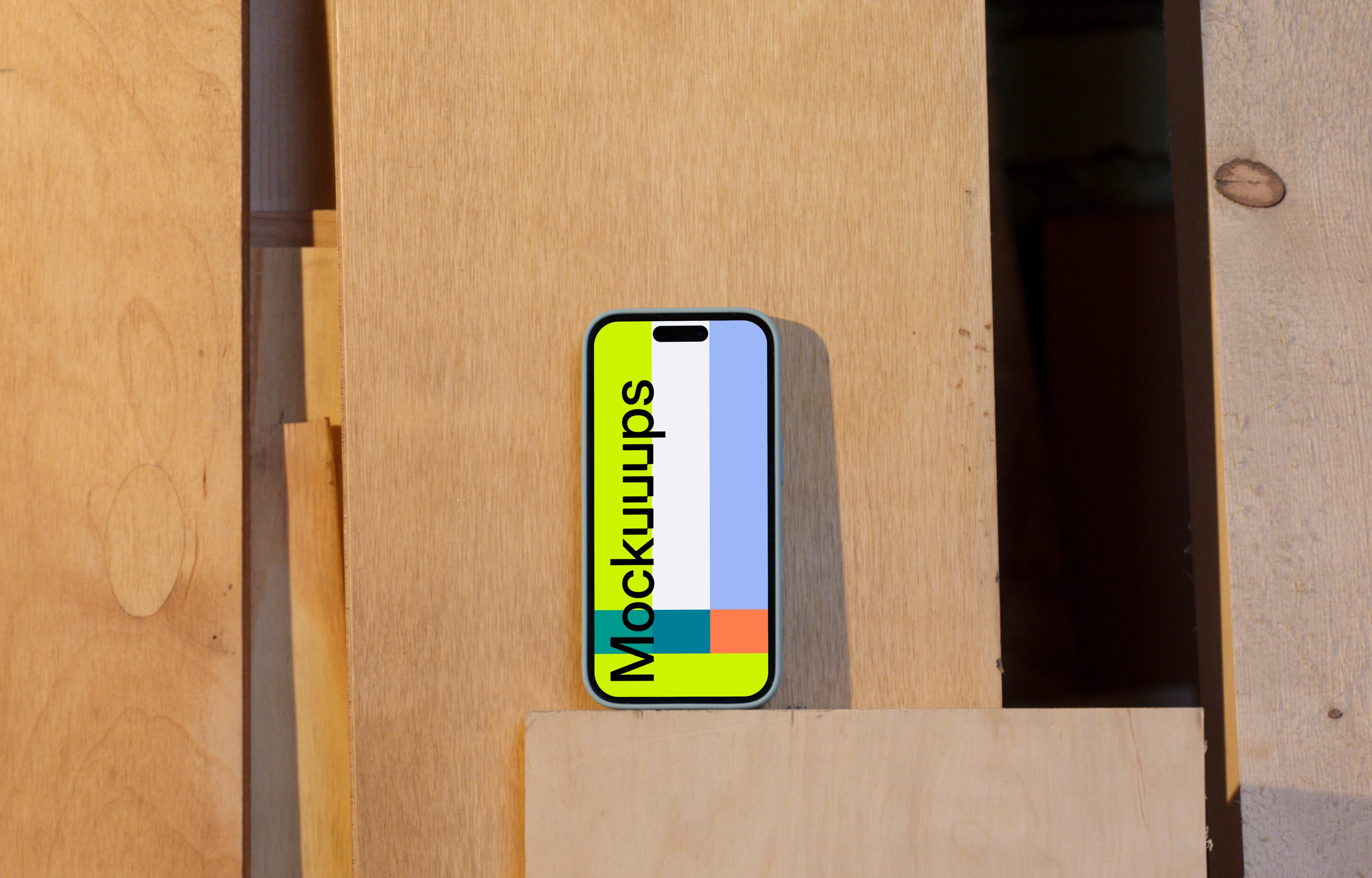 iPhone 14 Pro mockup placed on a wooden board