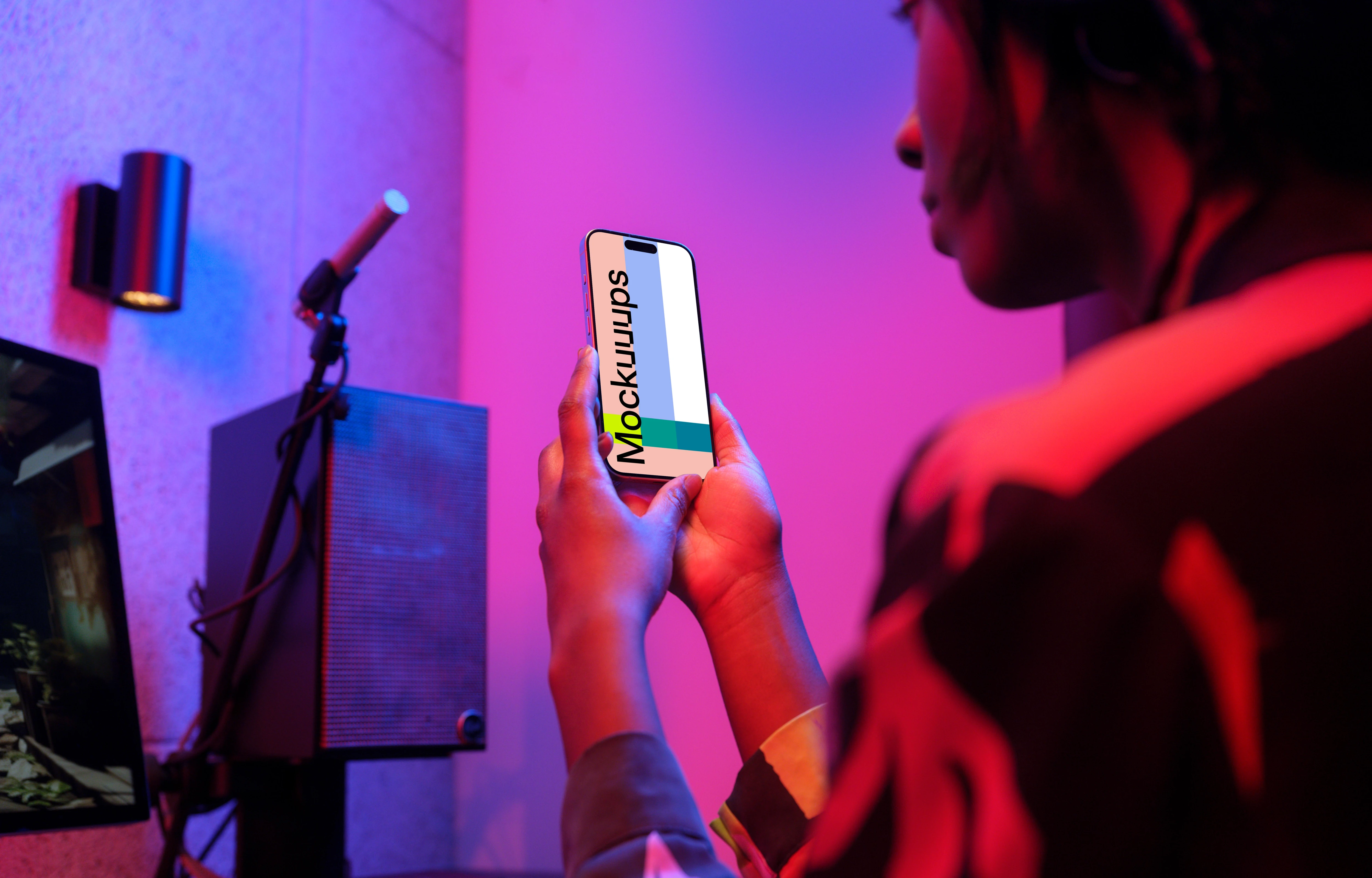 iPhone 15 Pro mockup in a gaming streamer setup