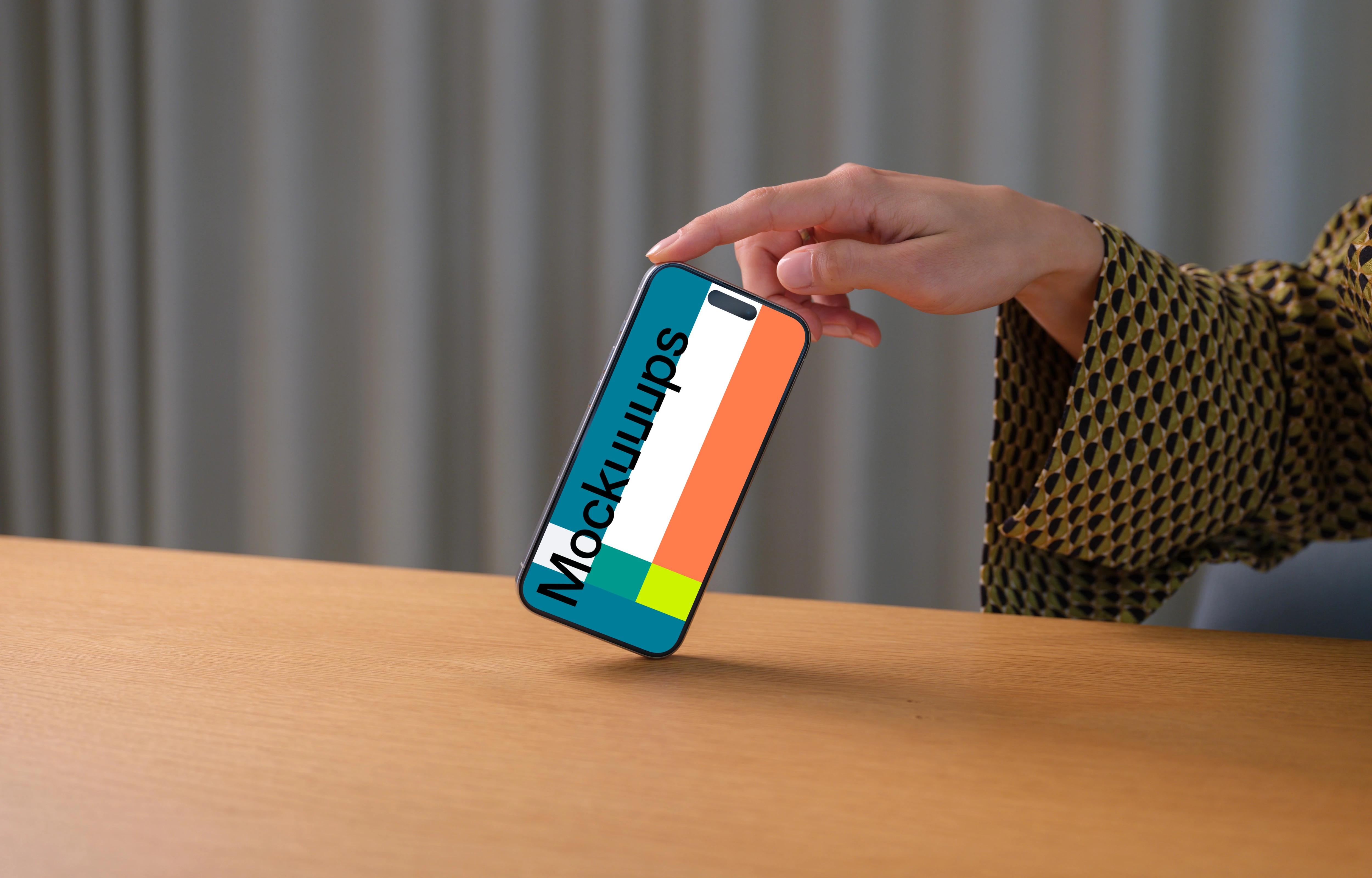 iPhone 15 Pro mockup in a woman's hand against office background