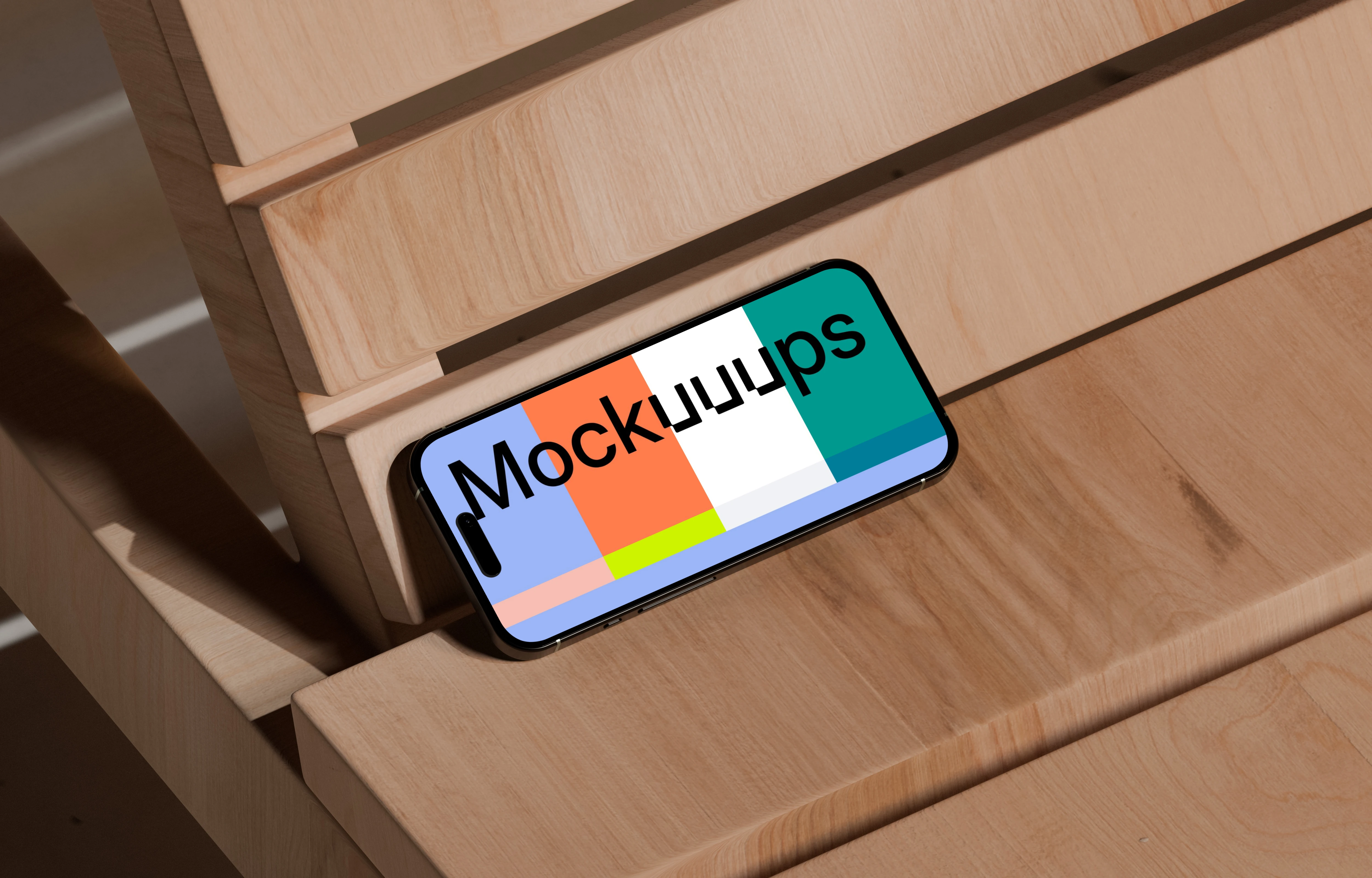 iPhone 16 mockup on wooden bench
