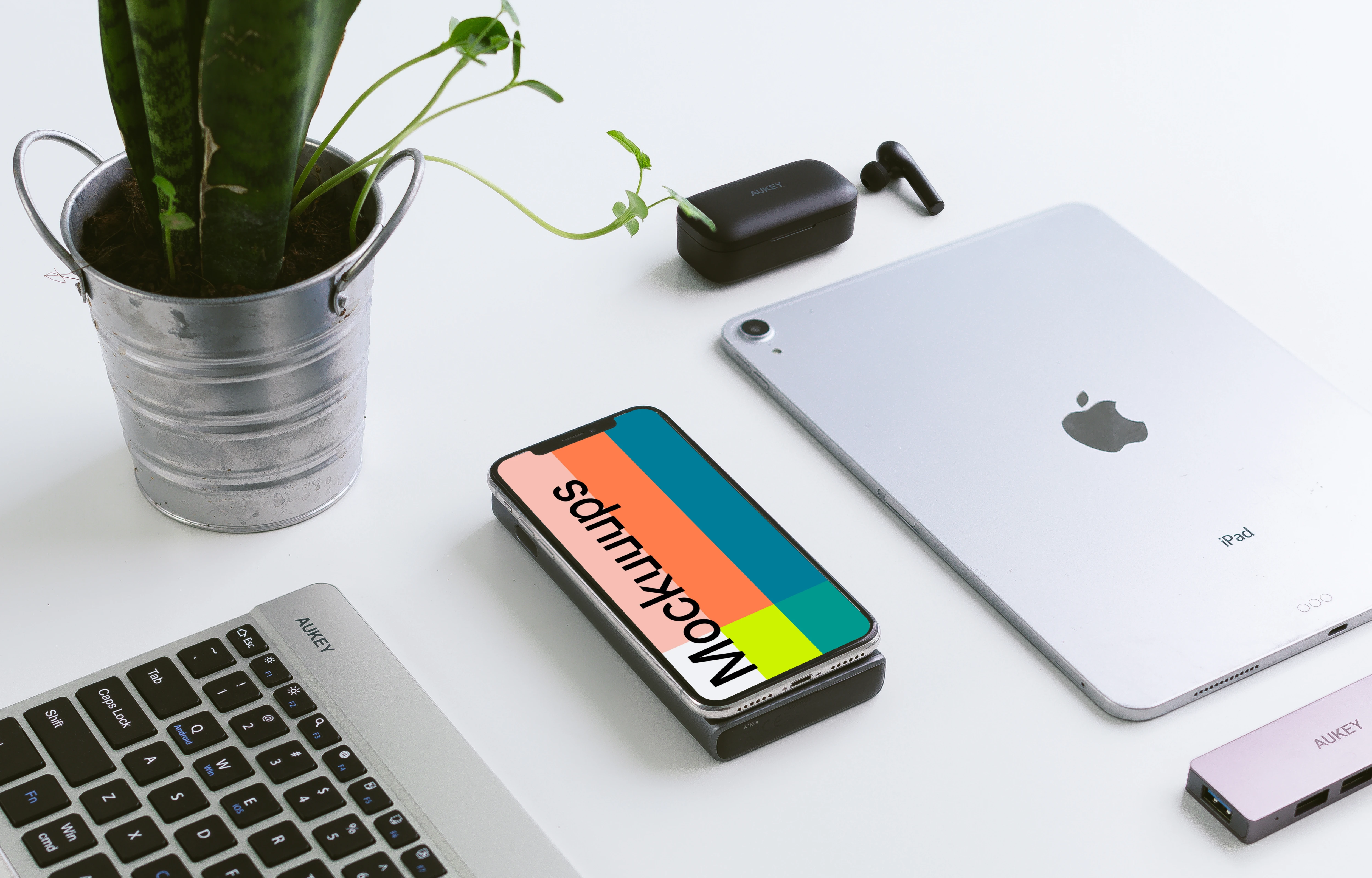 iPhone mockup beside iPad Air