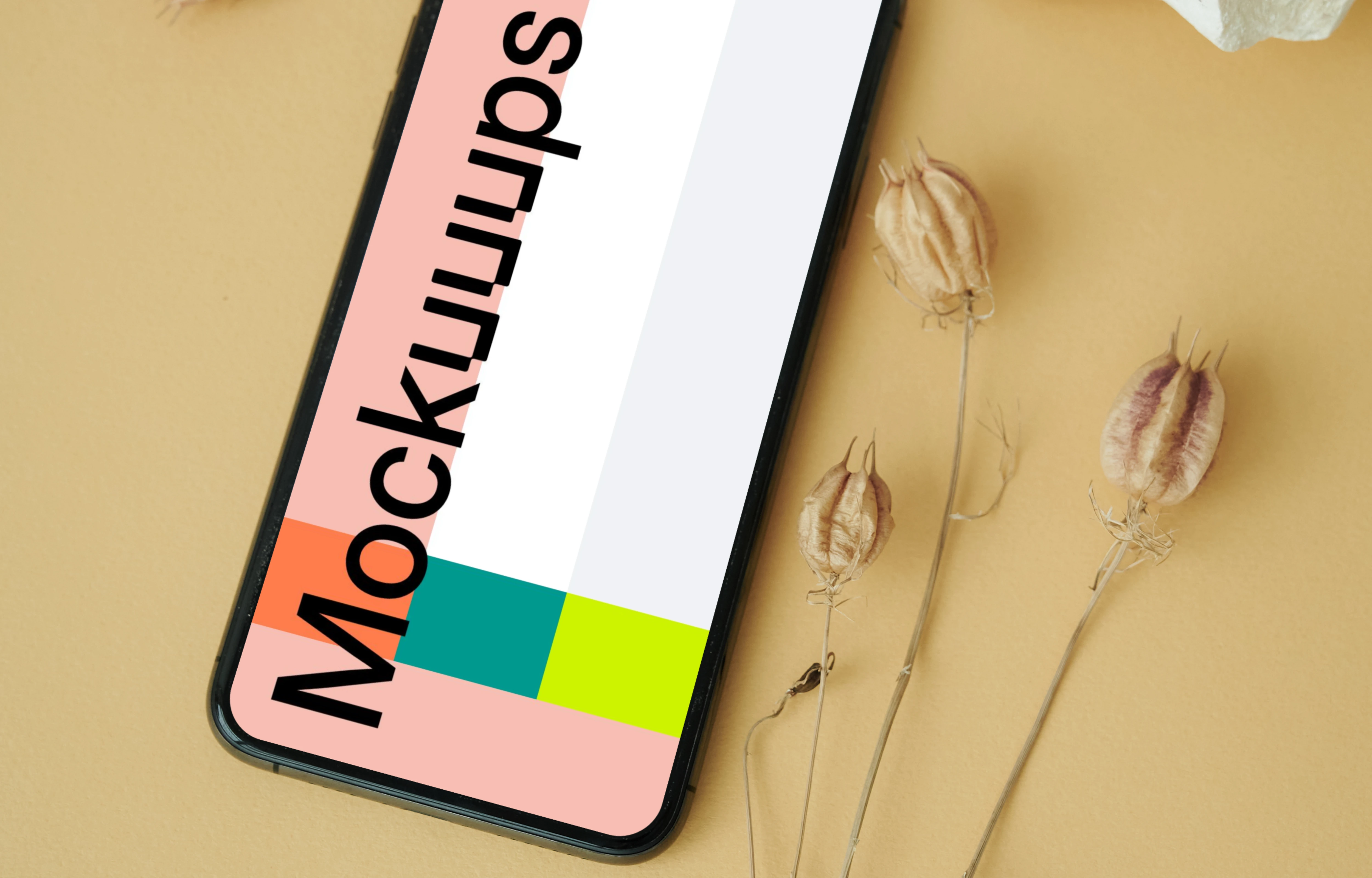 iPhone mockup on a light brown table