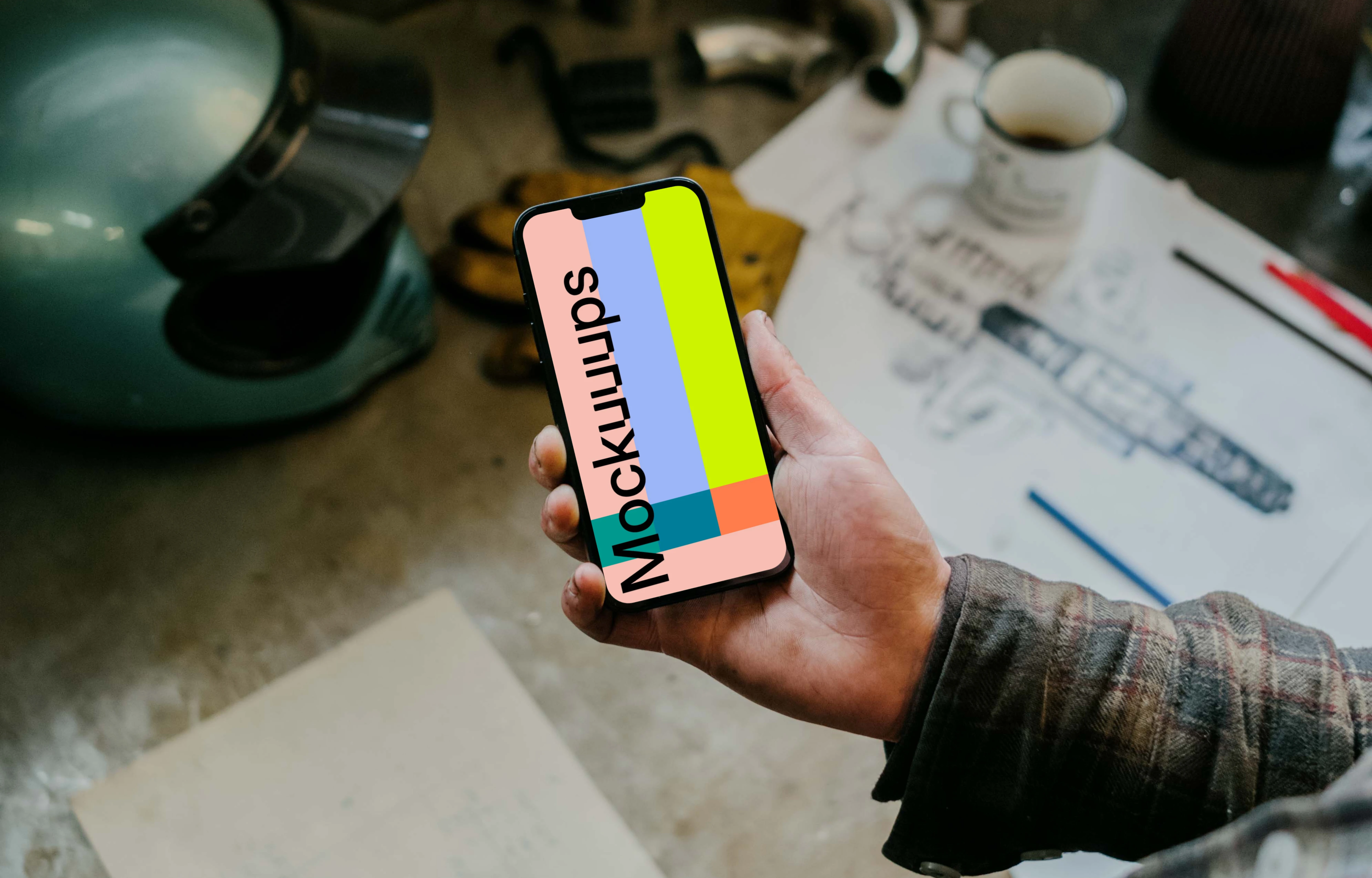 Man holding an iPhone 13 Pro mockup