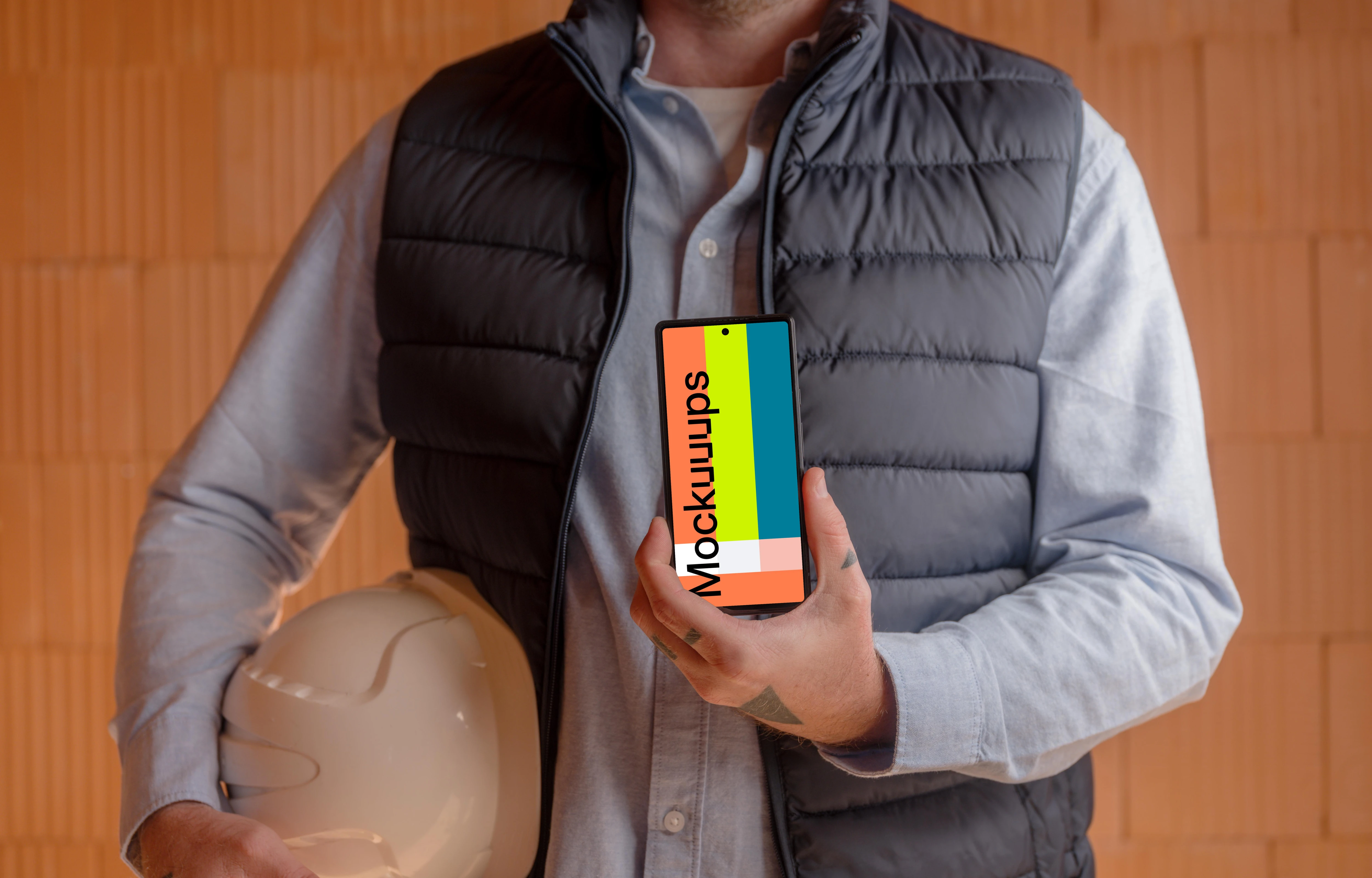 Construction worker, a helmet and a Google Pixel mockup