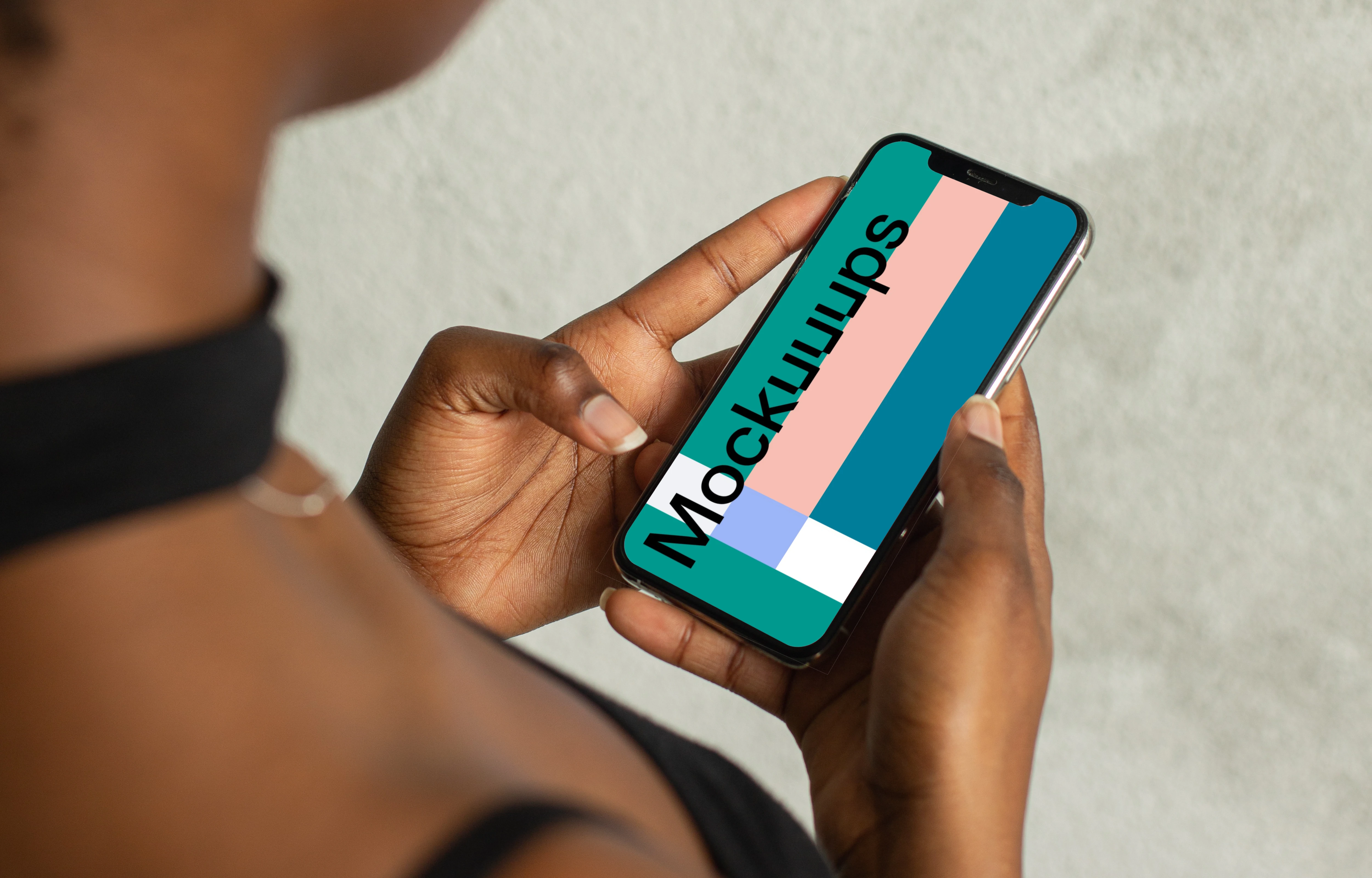 Lady using an iPhone 12 mockup