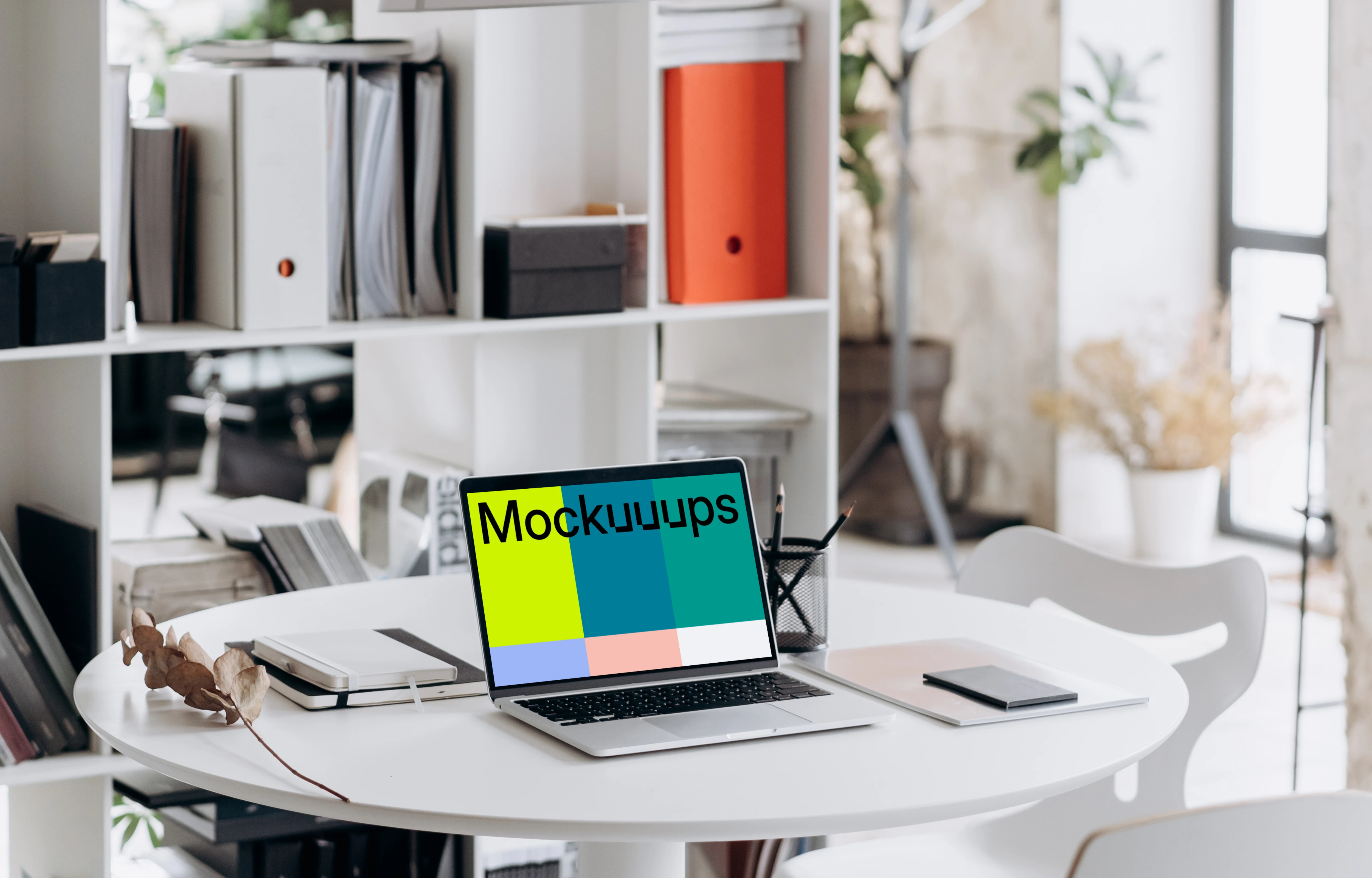 Laptop mockup in an office setting